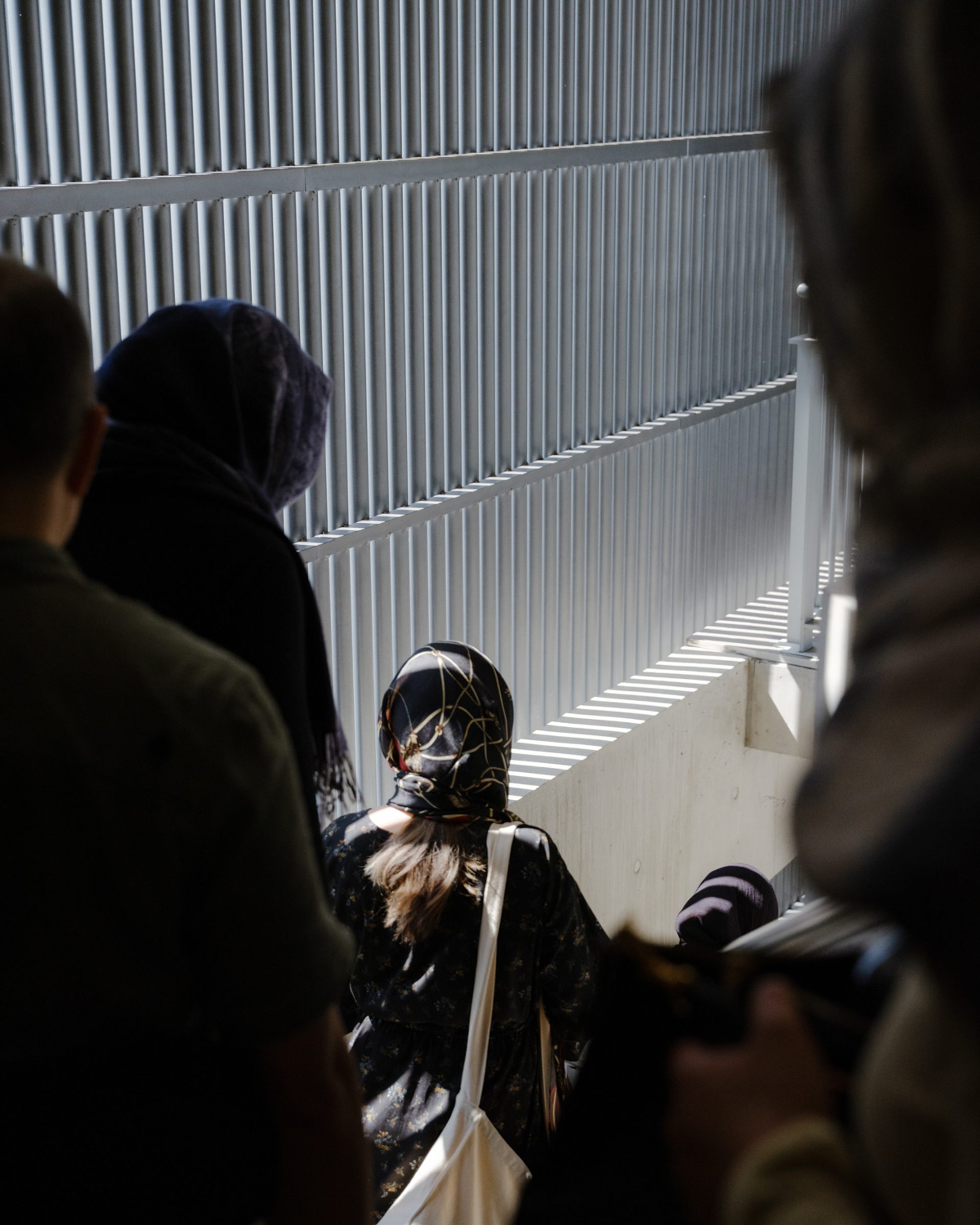 People walking downstairs