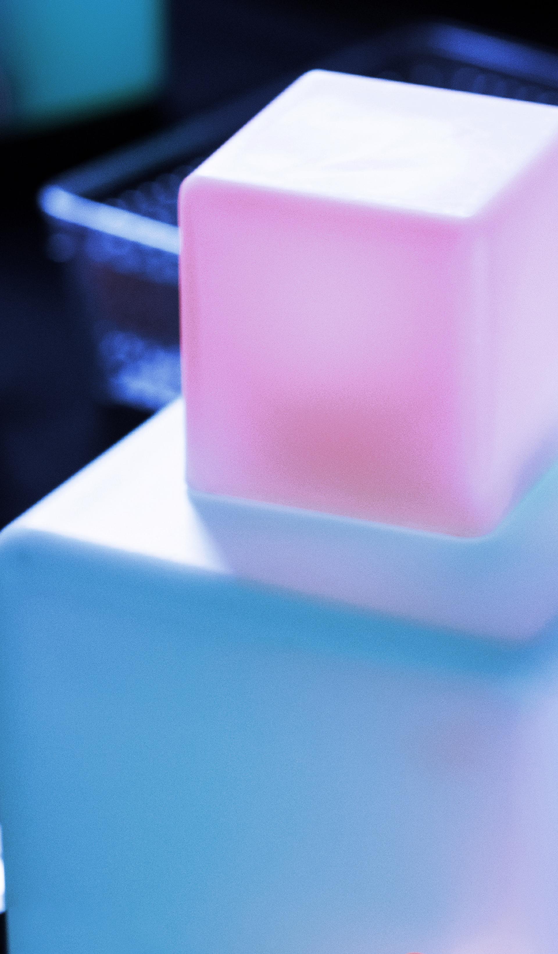 colourfully lit cubes stacked upon each other