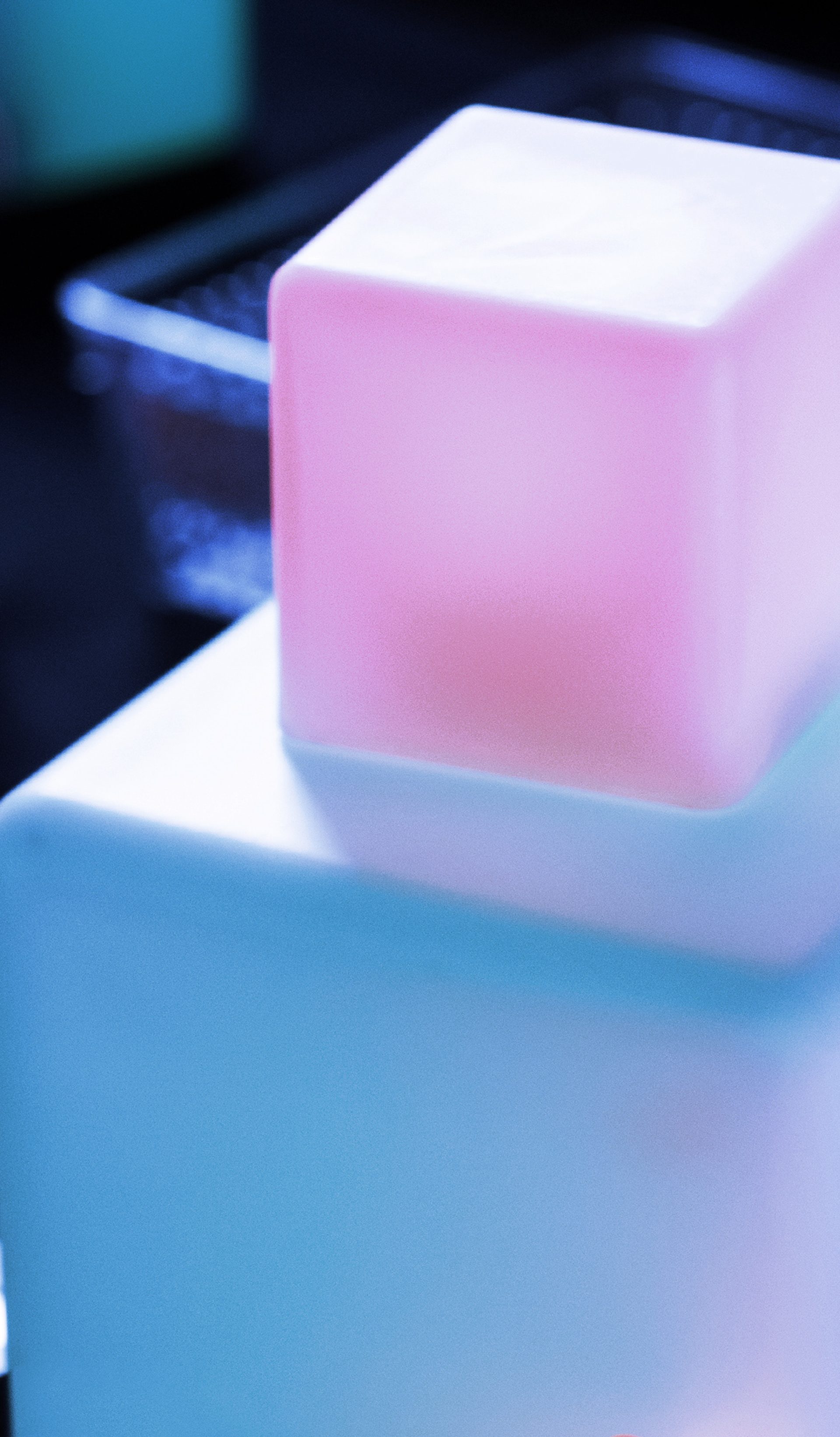 colourfully lit cubes stacked upon each other