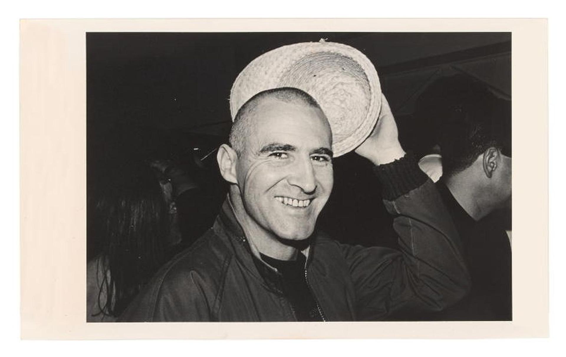 A mid shot black and white photograph of a man (Peter Tully)