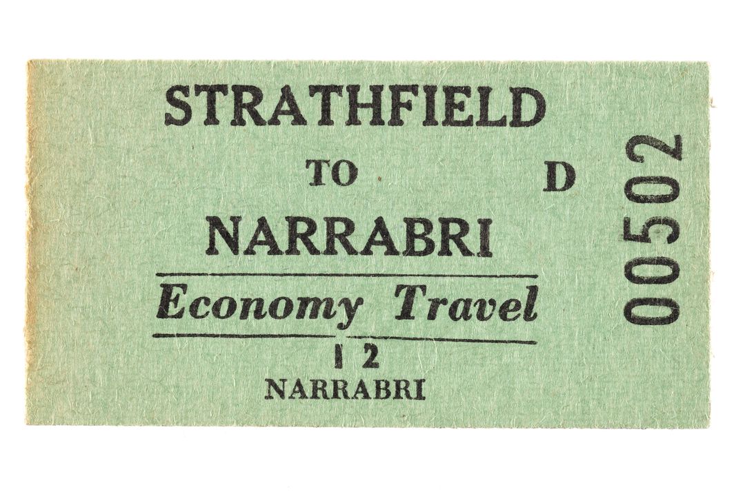 Green paper railway ticket for Economy Travel