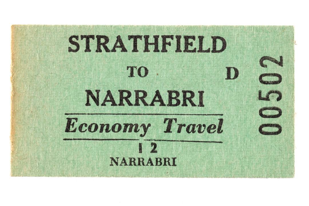 Green paper railway ticket for Economy Travel
