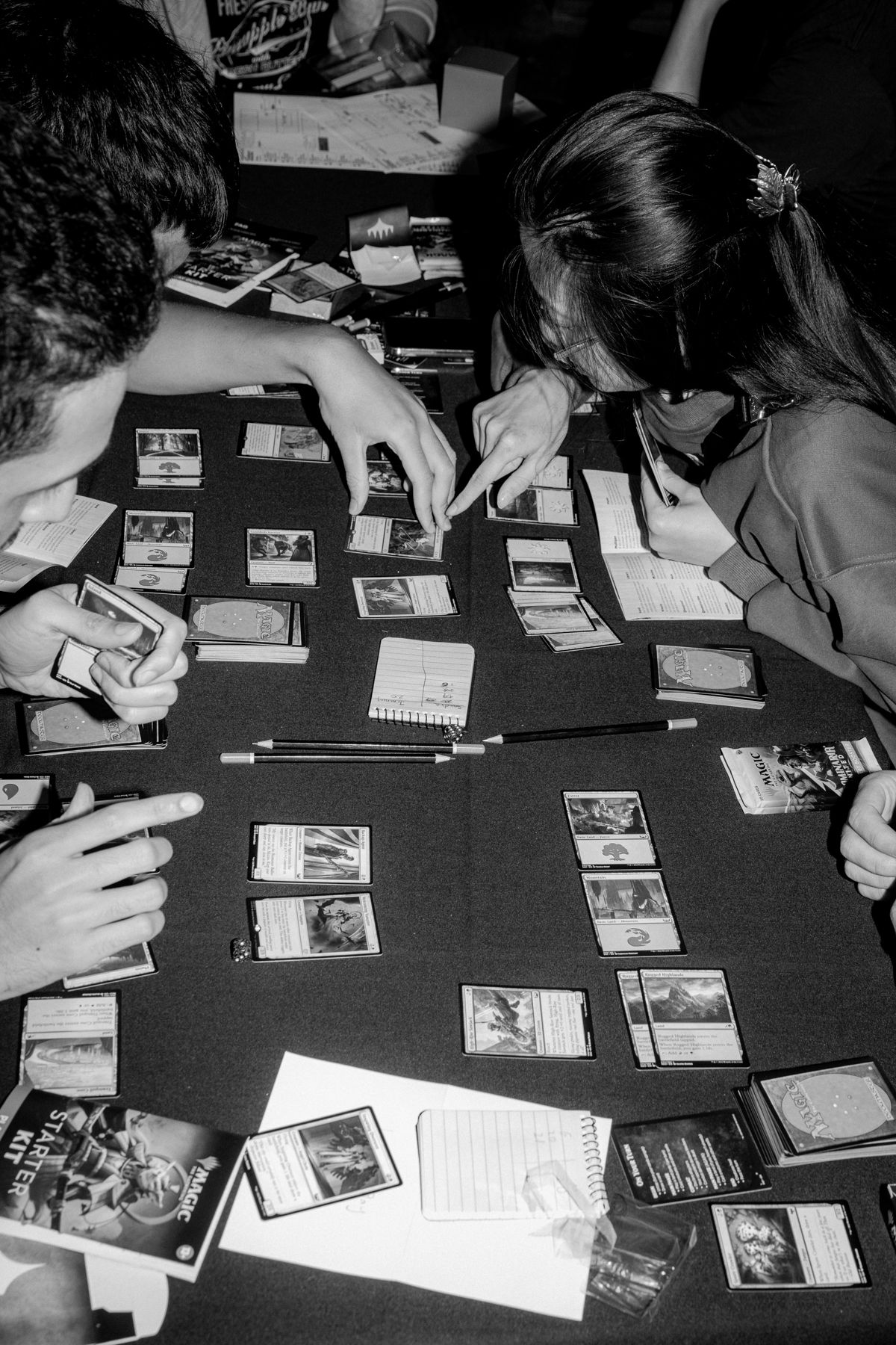 Group of people playing a card game