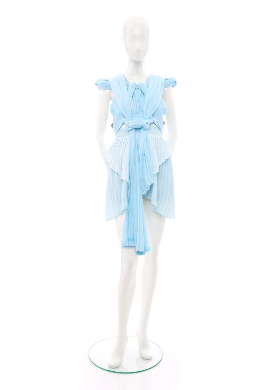 Blue dress on mannequin.