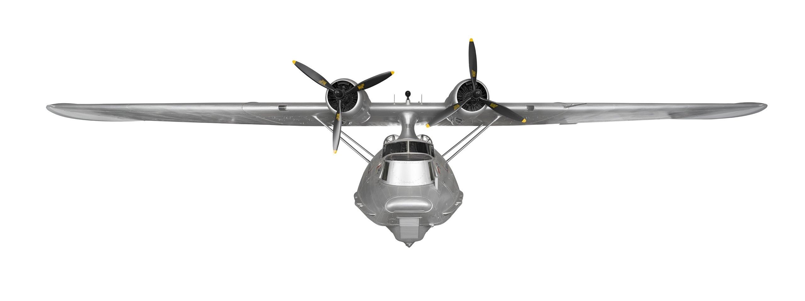 Front view of a twin-propeller flying boat.