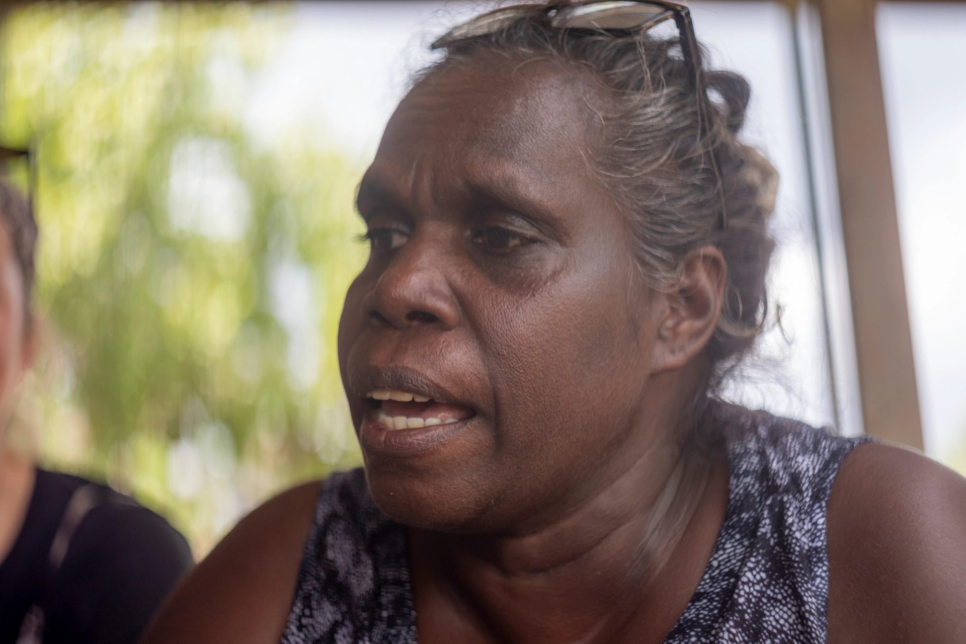 A woman looking away from the camera.