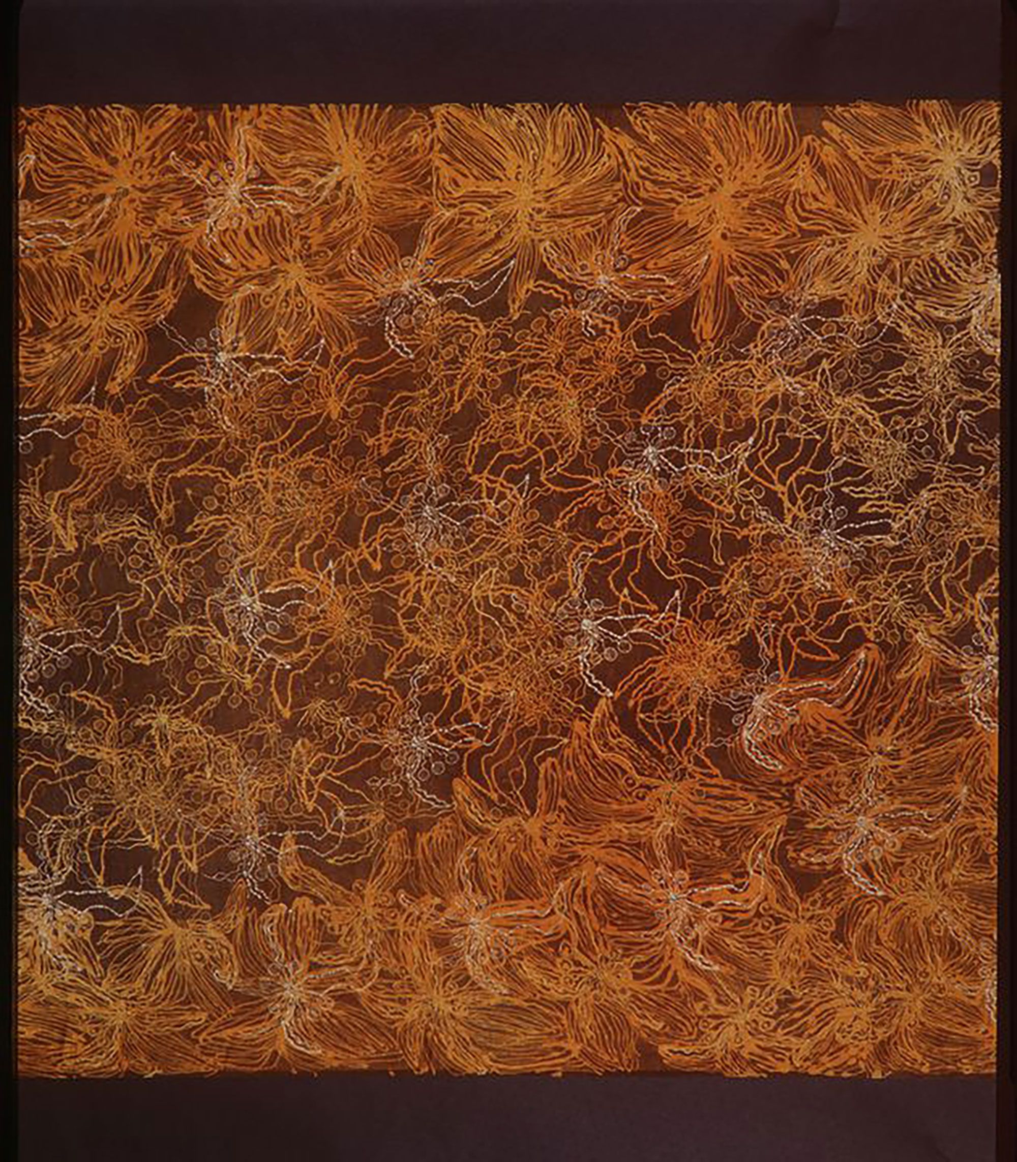 Textile with a green-brown background and dense random allover pattern of a bush tomato design in gold and white. Ends unhemmed.