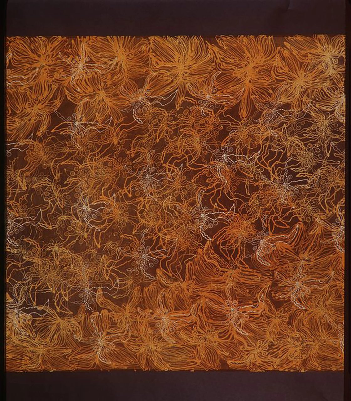 Textile with a green-brown background and dense random allover pattern of a bush tomato design in gold and white. Ends unhemmed.