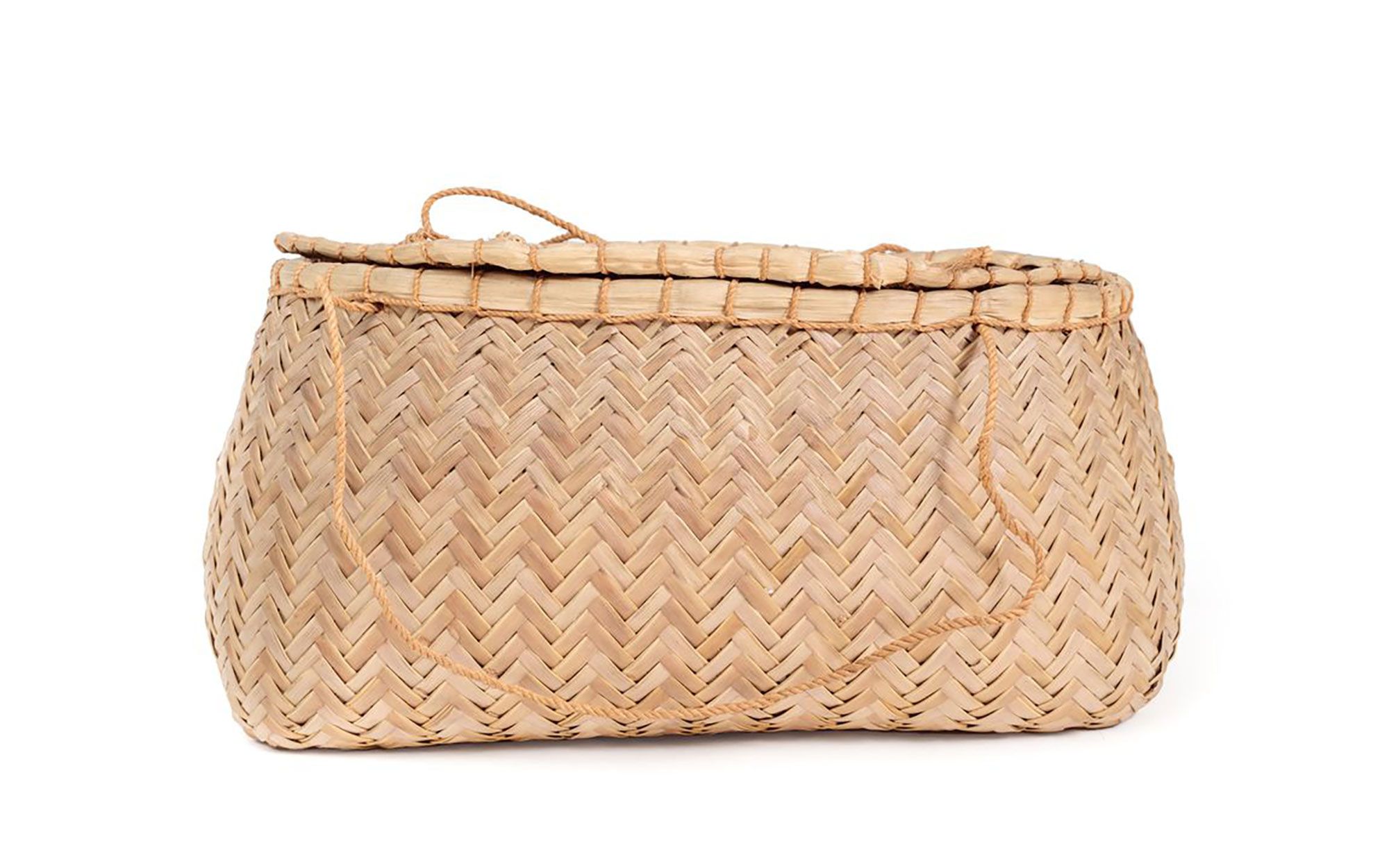 A basket made of woven coconut frond.