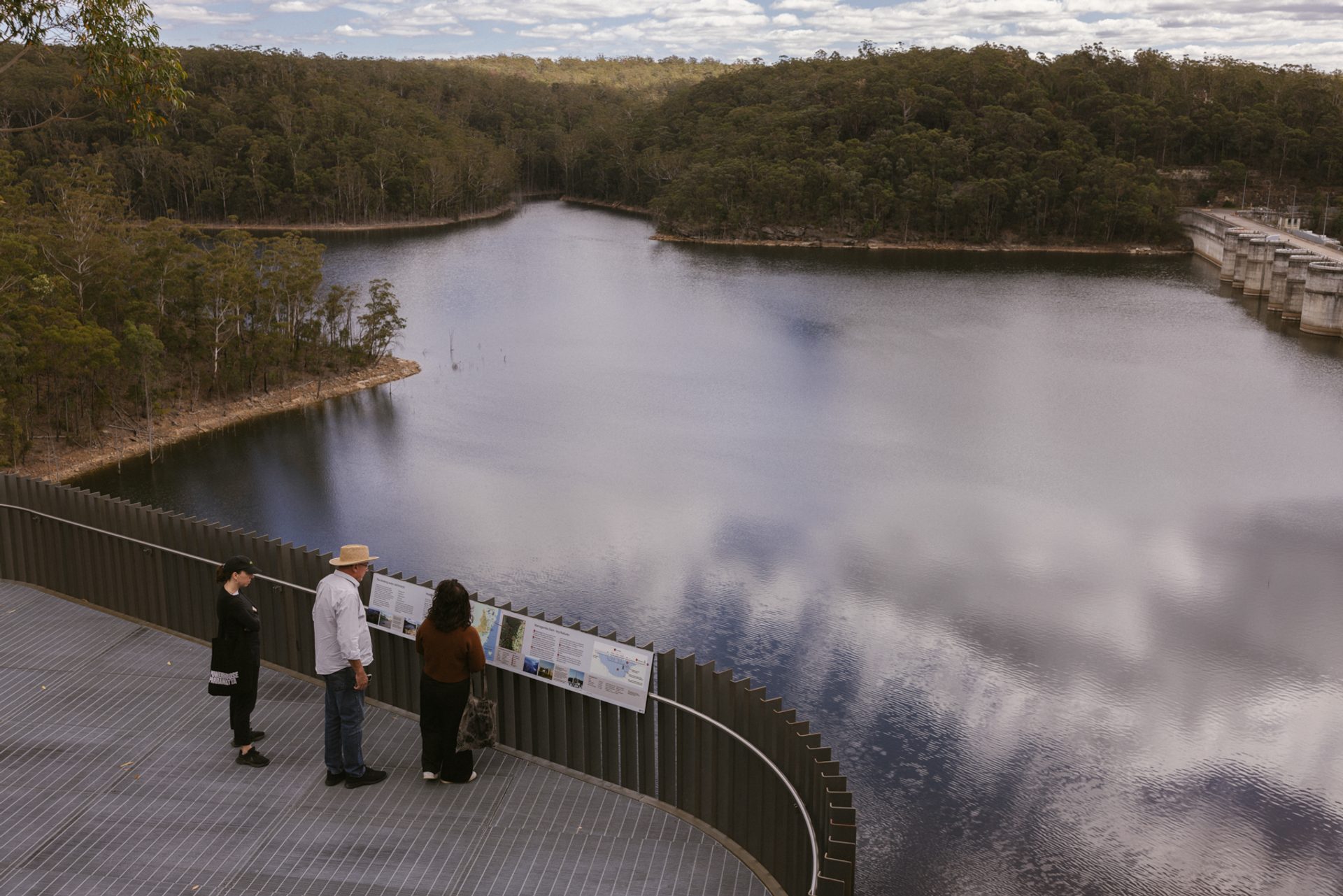 Visitors look over the edge of Waragamba Dam