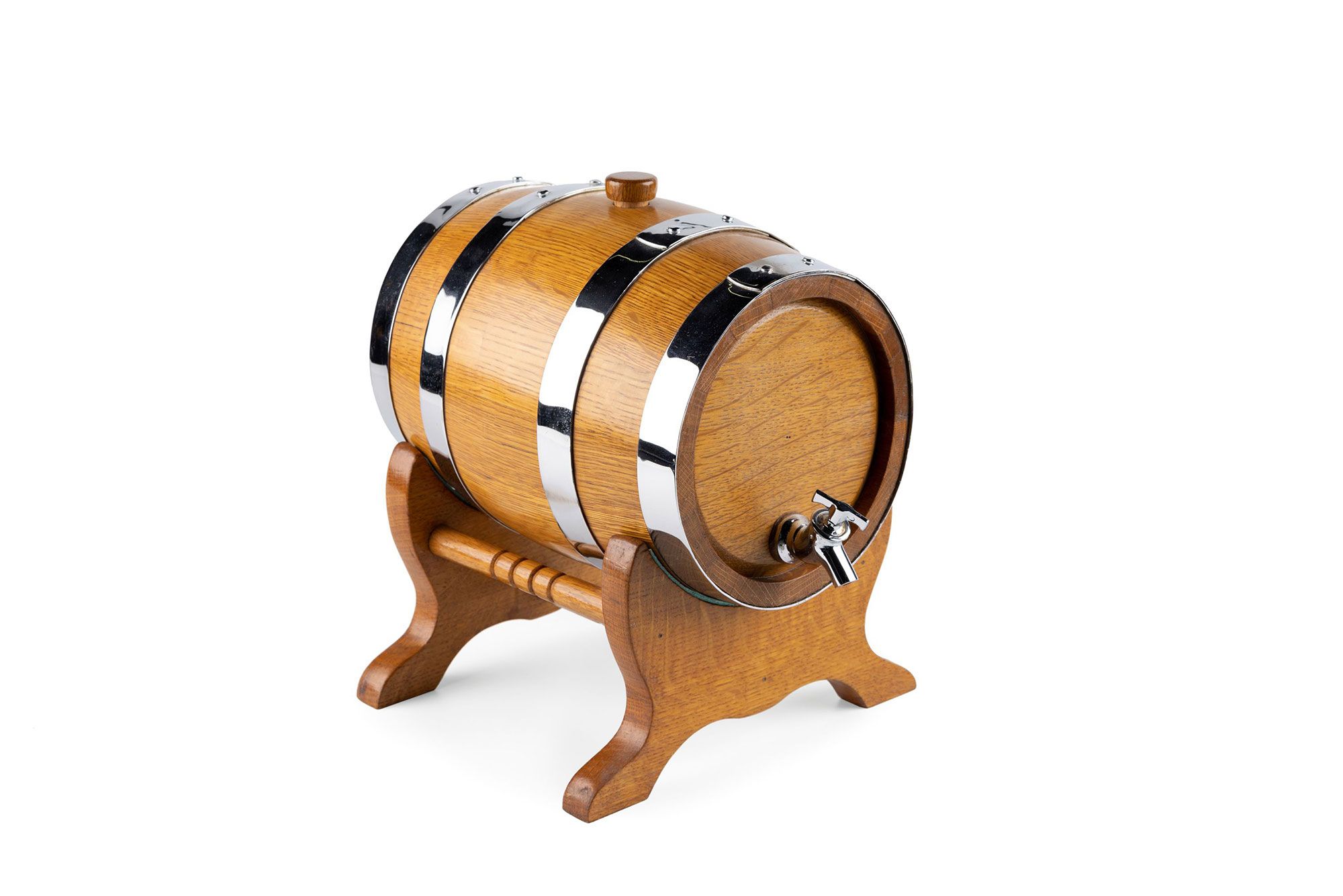 Miniature wooden barrel on four legs. It has four silver rings around it.