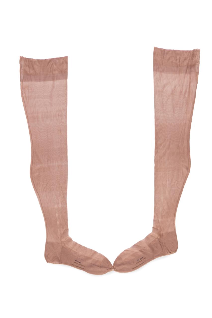 Pair of nude tone silk stockings.