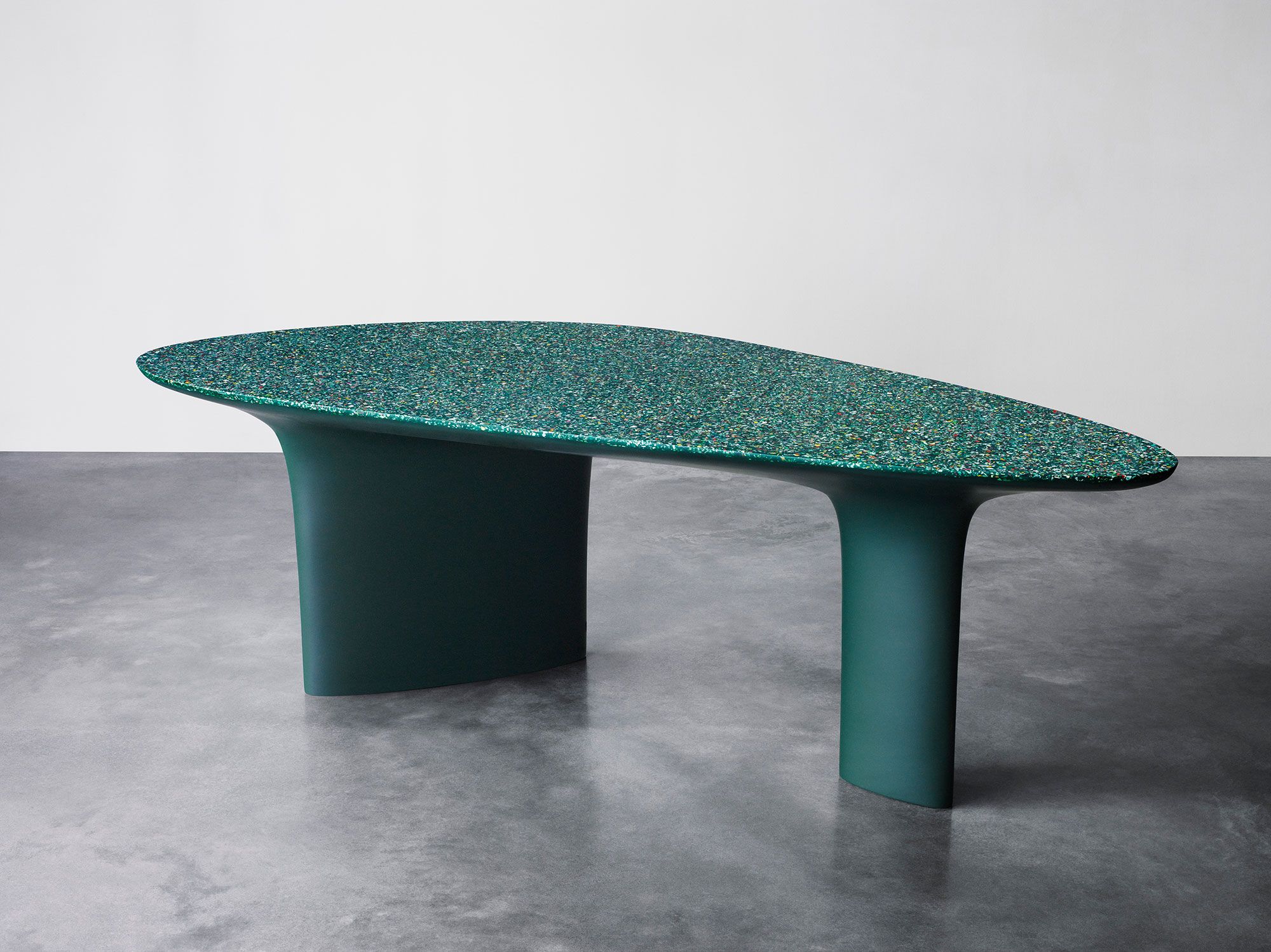 A table made of ocean plastic aggregate with green bio-resin