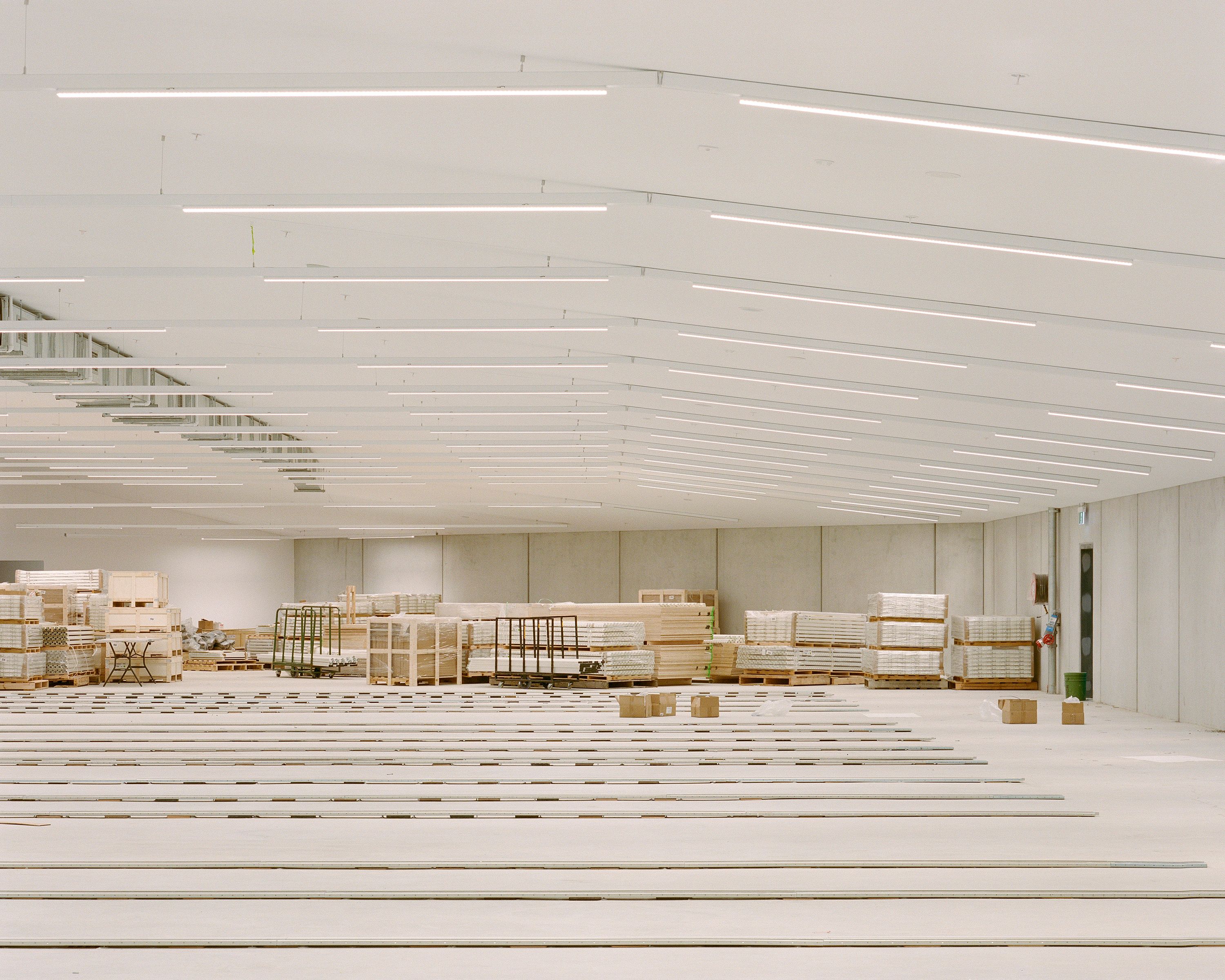 Piles of construction material in a big open space