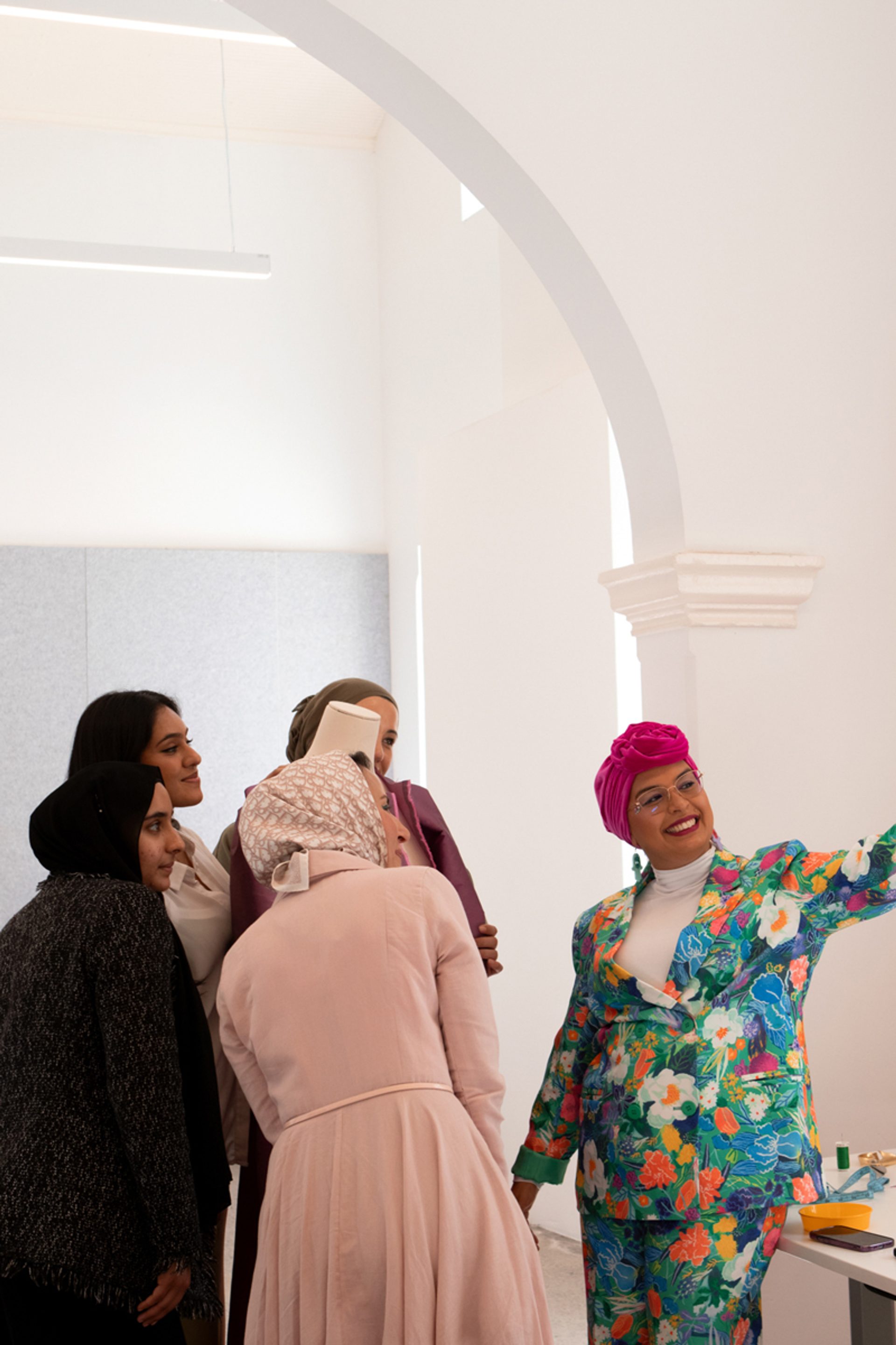 Figures taking a selfie together and leaning in