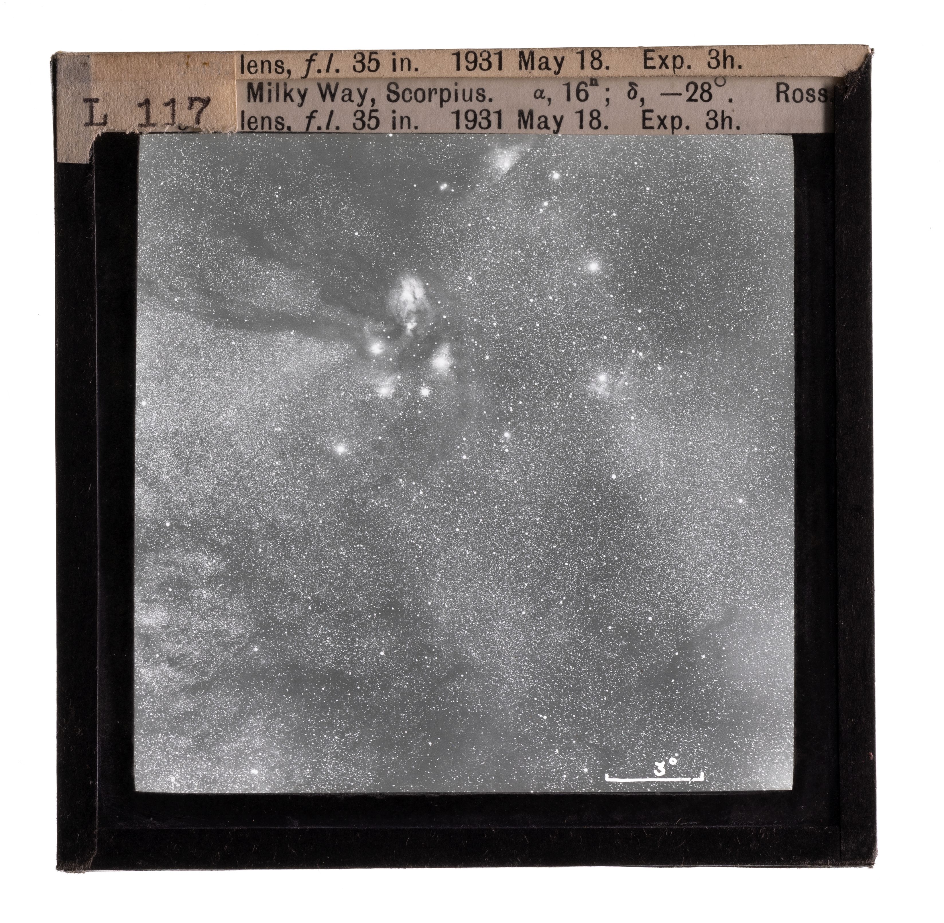 Photograph of a glass lantern slide used for teaching astronomy depicting the Milky Way and Scorpius.