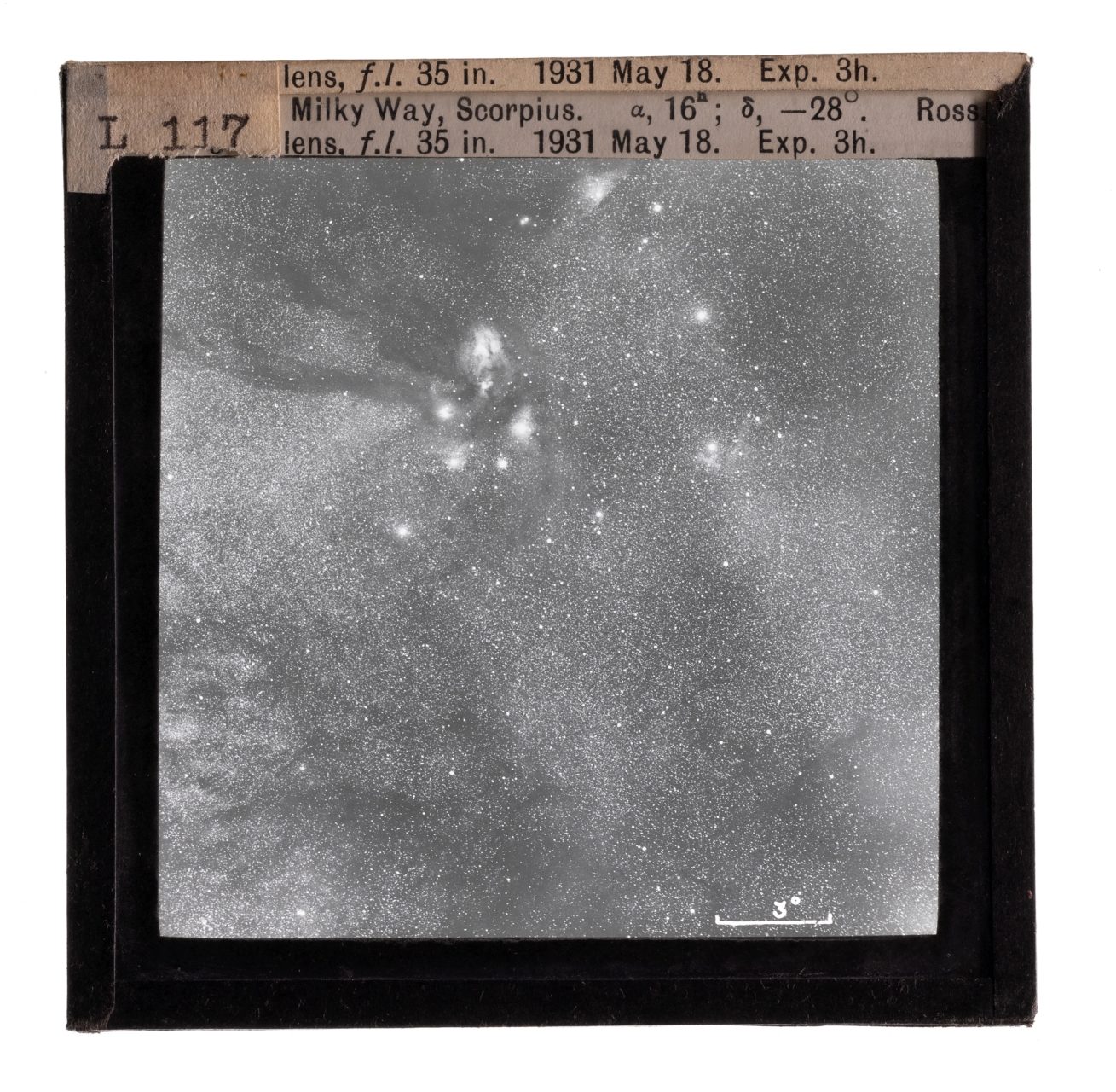 Photograph of a glass lantern slide used for teaching astronomy depicting the Milky Way and Scorpius.