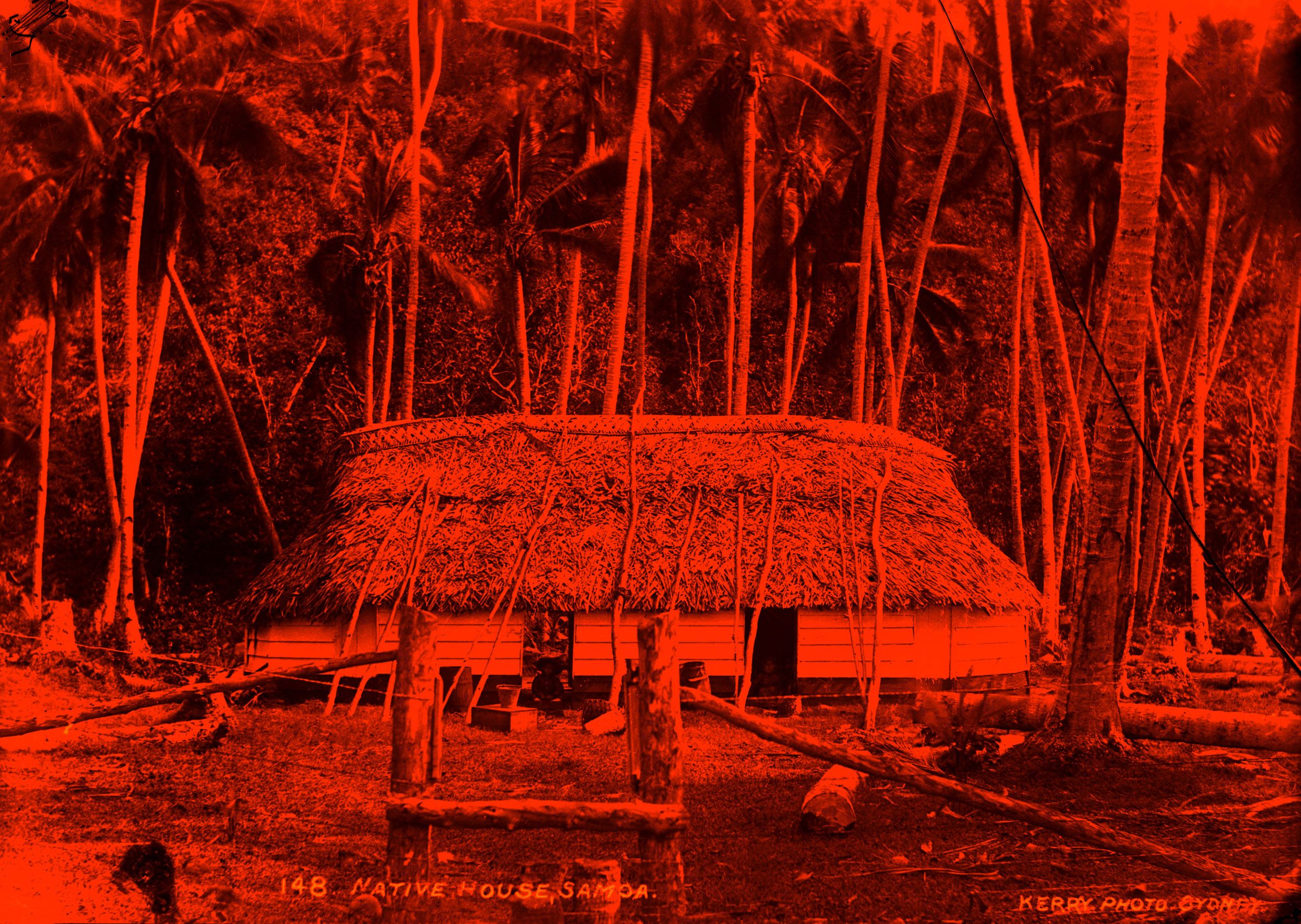 Sāmoan building consisting of a thatched roof and white weatherboard walls.