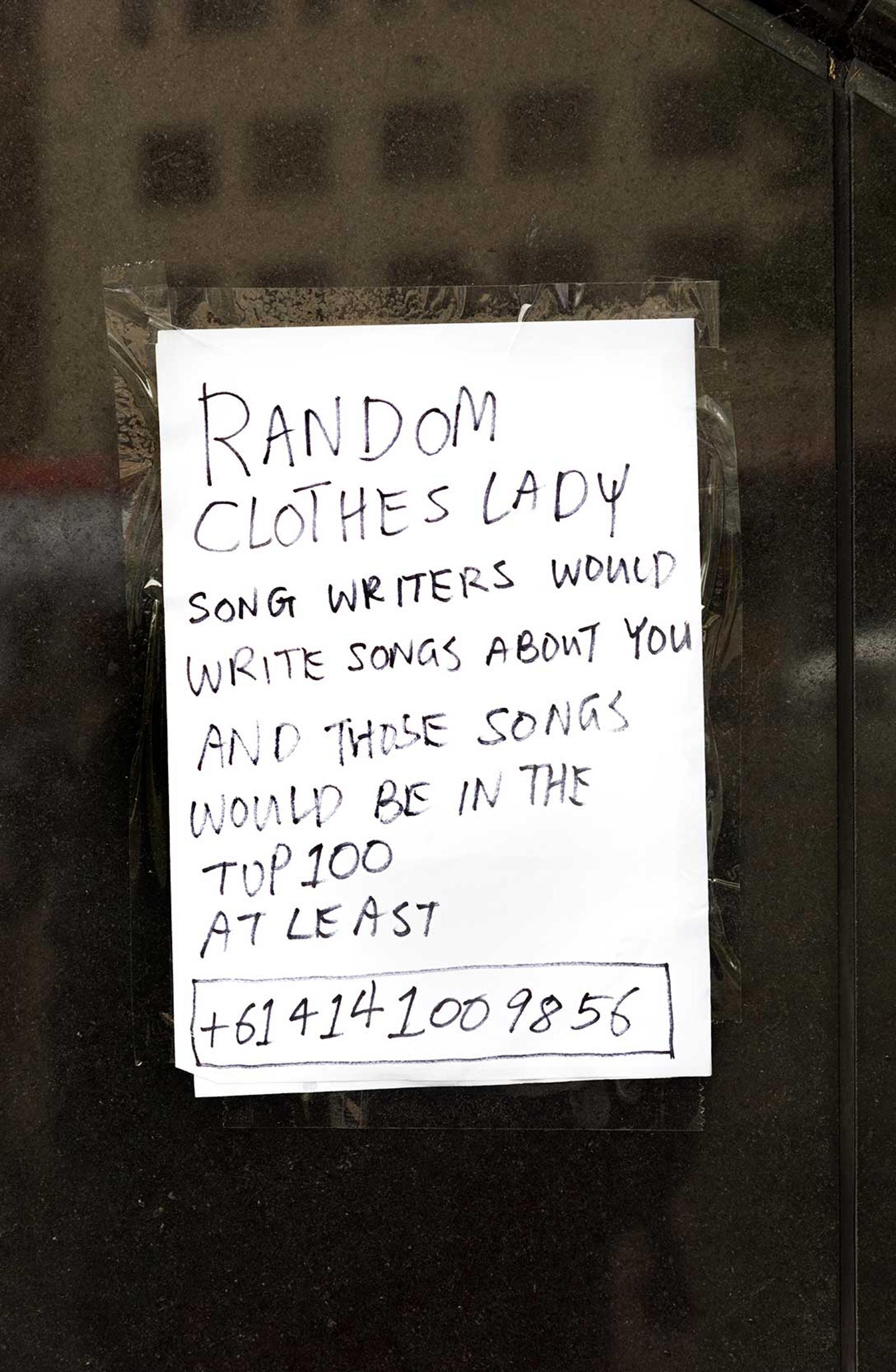 Note reading “RANDOM CLOTHES LADY SONG WRITERS WOULD WRITE SONGS ABOUT YOU AND THOSE SONGS WOULD BE IN THE TOP 100 AT LEAST”