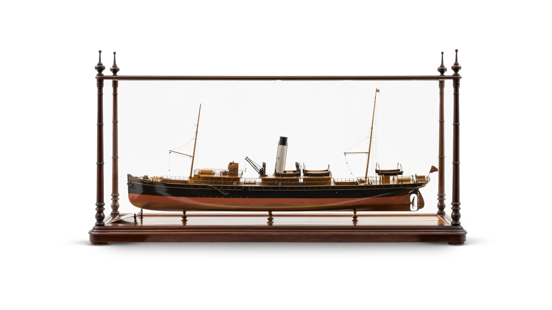Model of the SS 'Peregrine' steam ship, using wood with metal trimmings and mounted inside a glass case.
