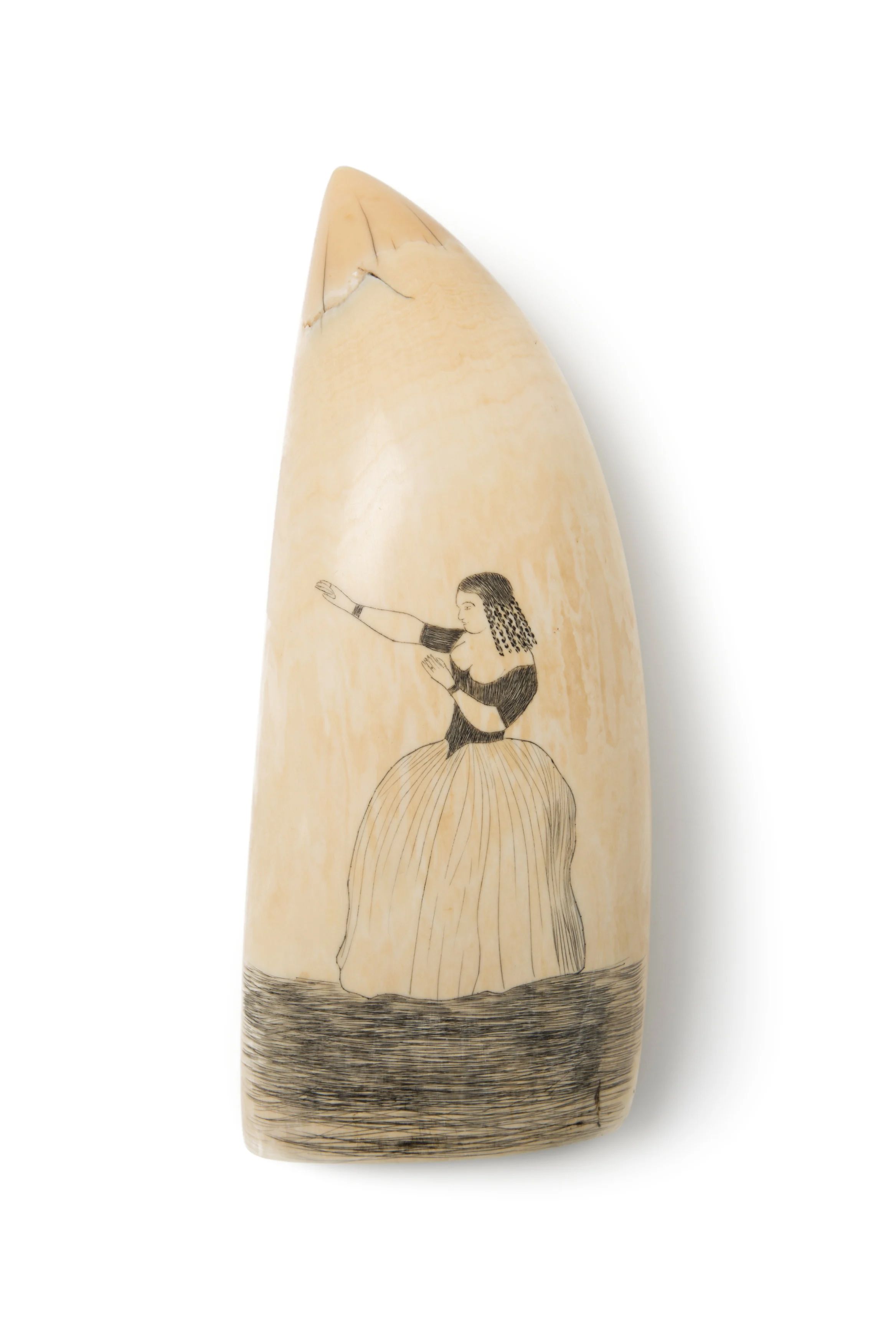 Sperm whale tooth scrimshaw, with the carving of woman, holding her arms up to the left.