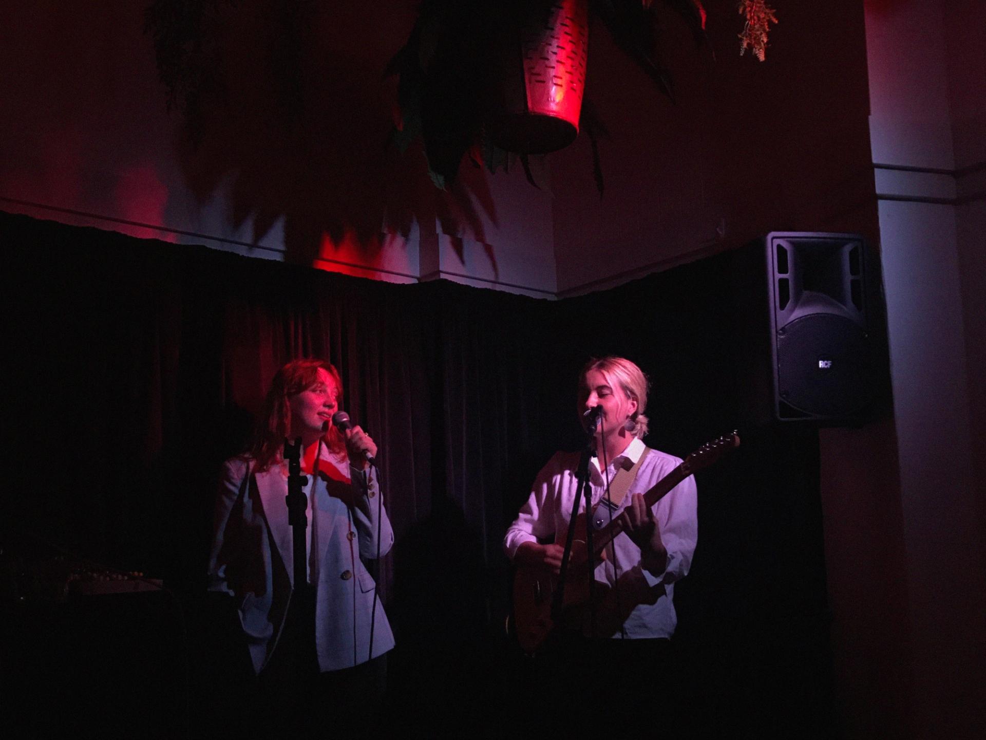 ROMÆO and Kiri on stage, performing.