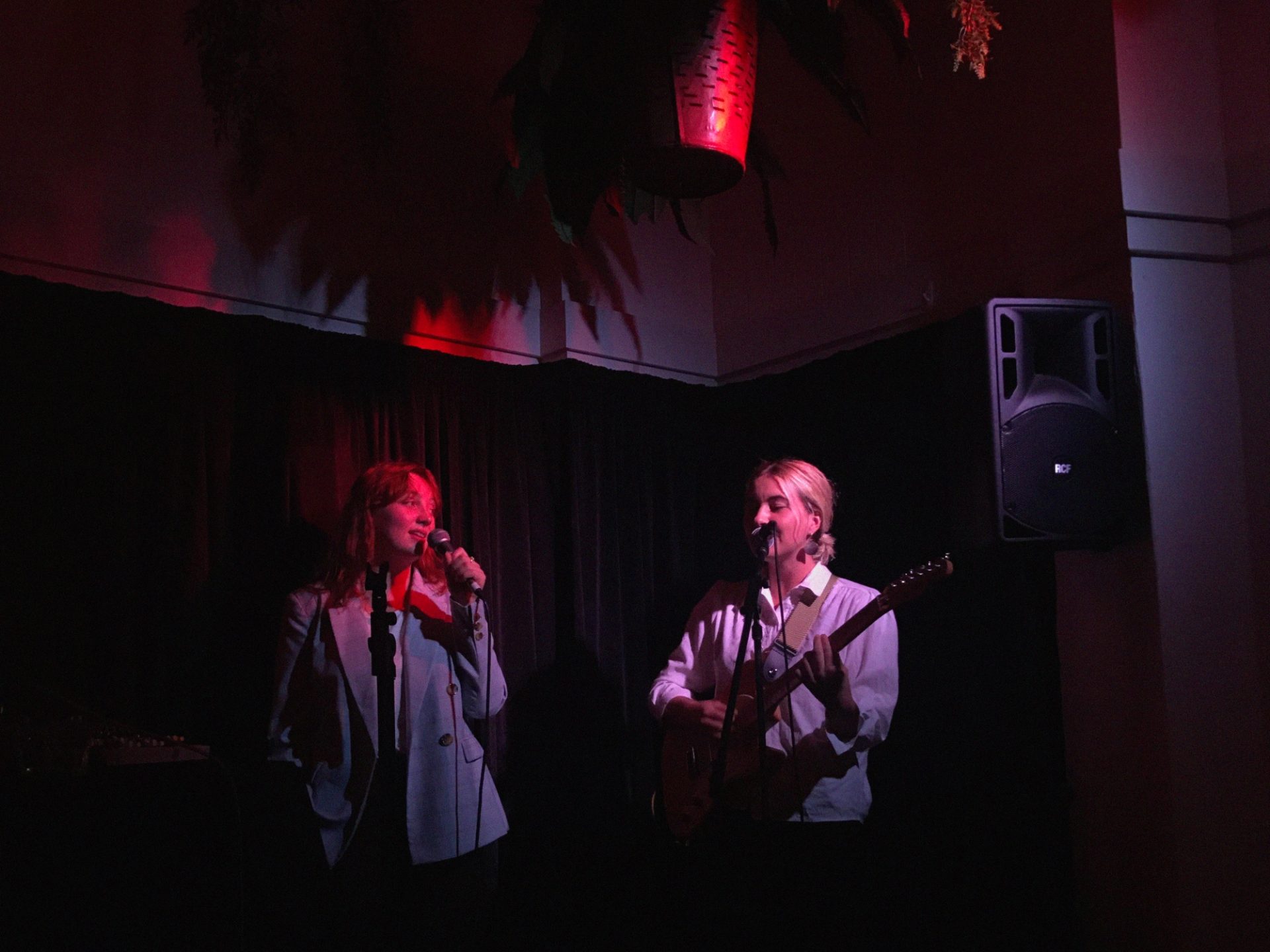 ROMÆO and Kiri on stage, performing.