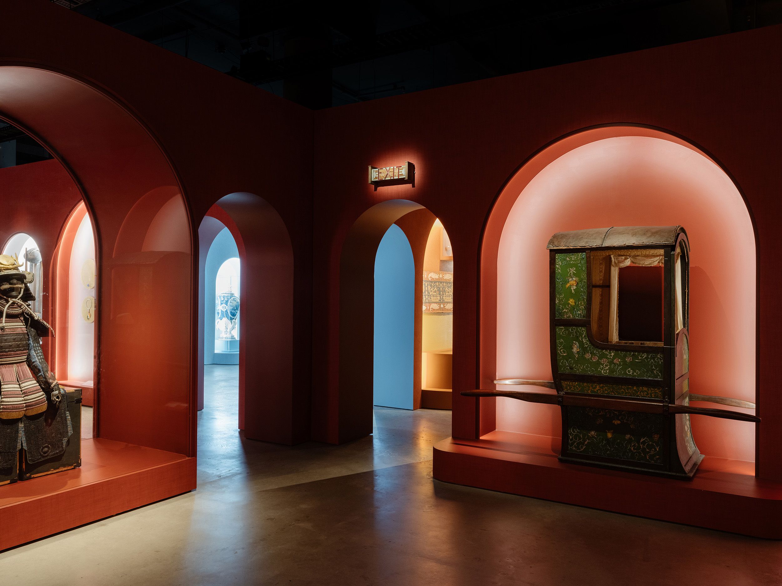 Red walled corner in exhibition.