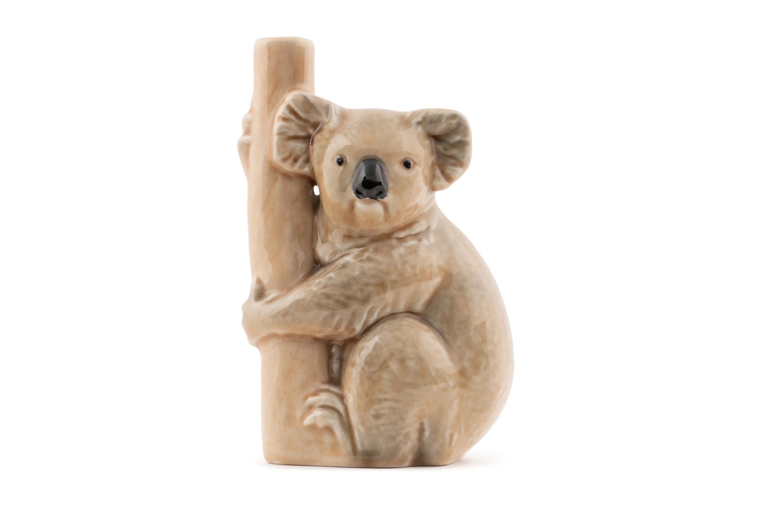 A light coloured earthenware wine bottle in the shape of a koala.