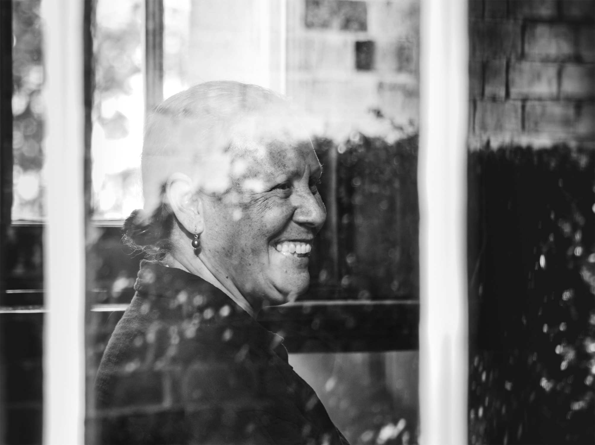 A Papua New Guinea woman listens to a conversation.