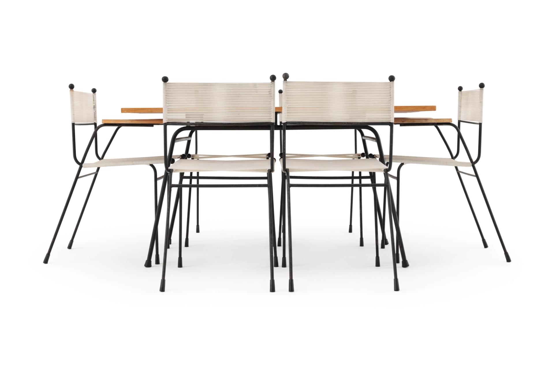 Dining table with four dining chairs and two carvers.