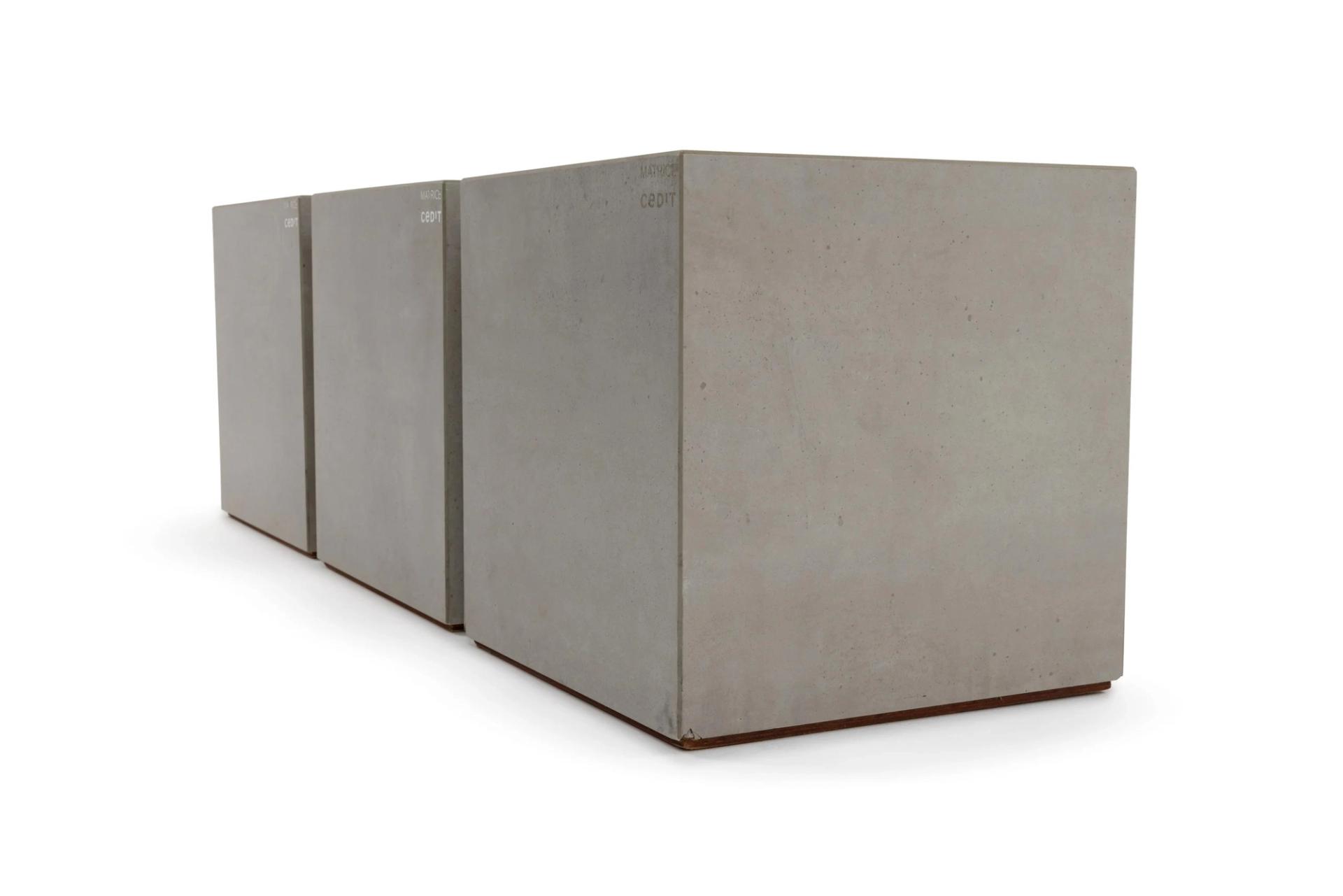 Three concrete blocks in a row