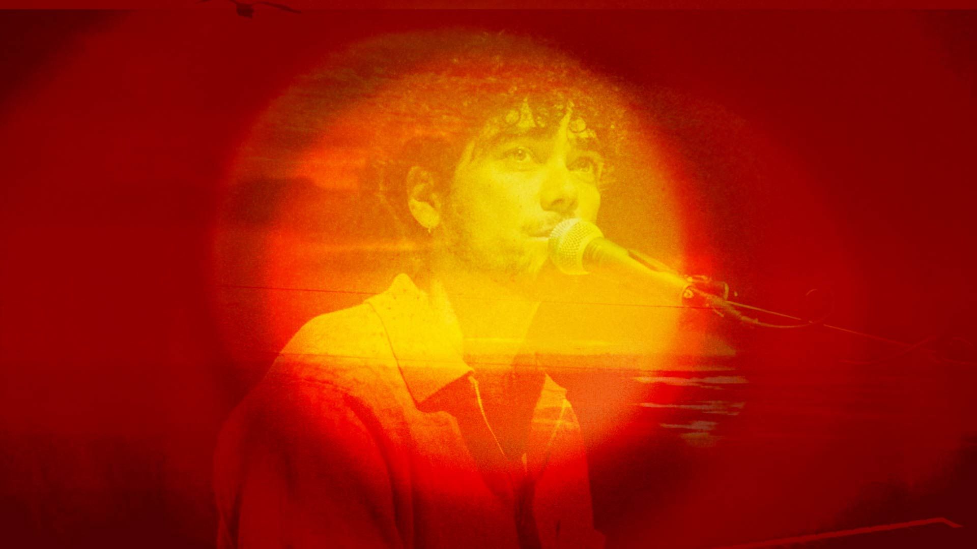 Photo bashed motion image with bright orange sunsets and natural textures over a silhouette of musician Setwun.