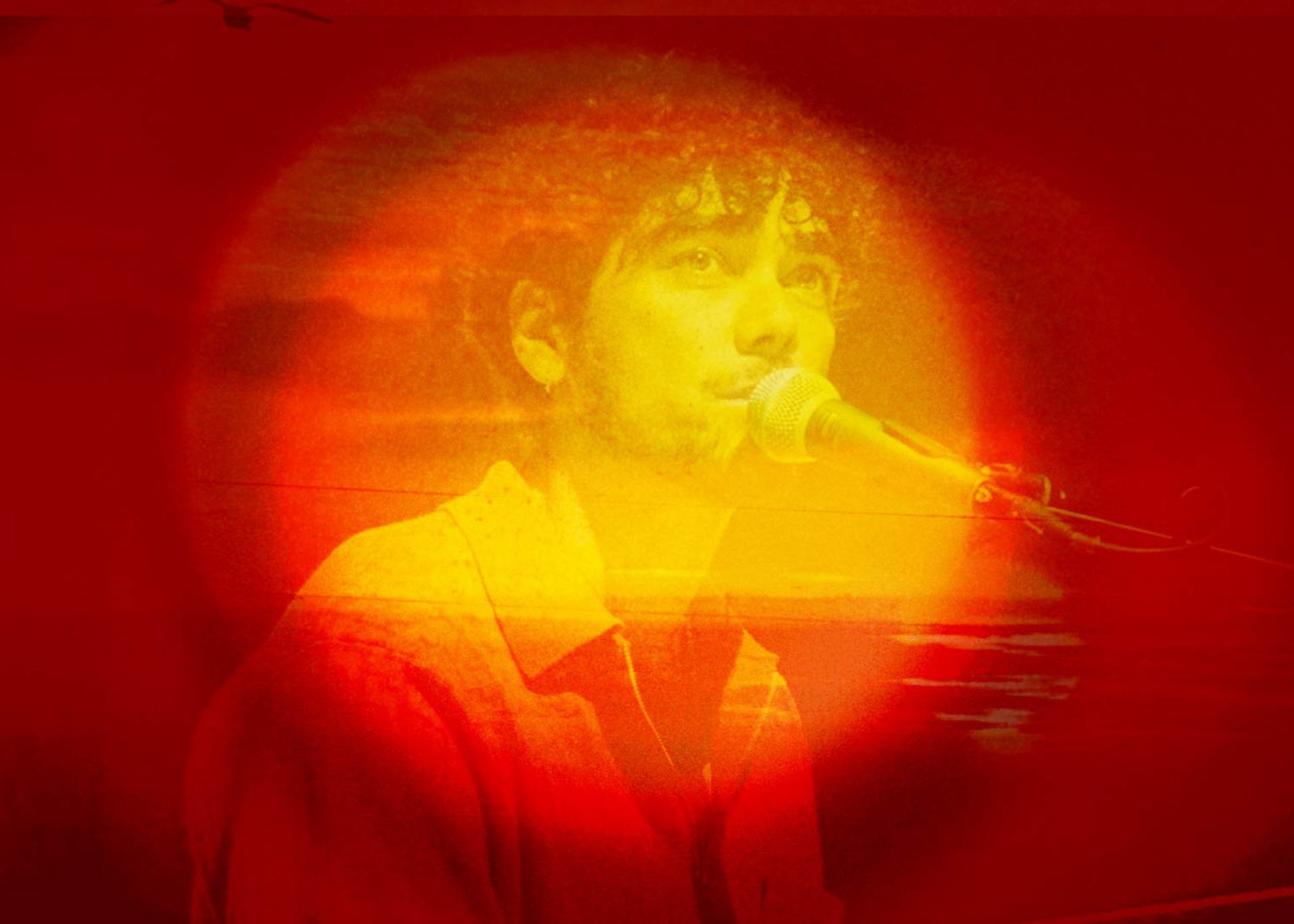 Photo bashed motion image with bright orange sunsets and natural textures over a silhouette of musician Setwun.