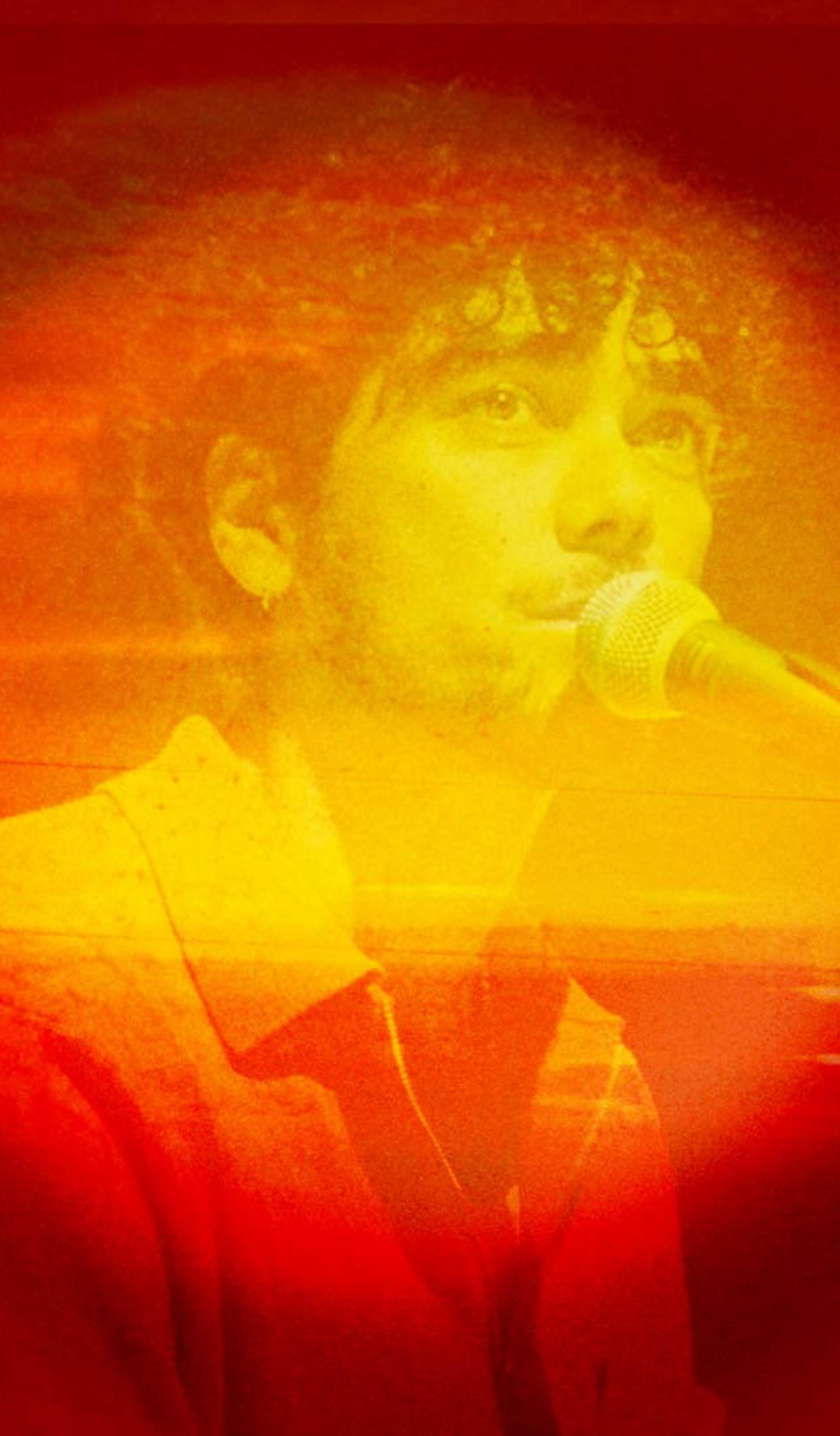 Photo bashed motion image with bright orange sunsets and natural textures over a silhouette of musician Setwun.
