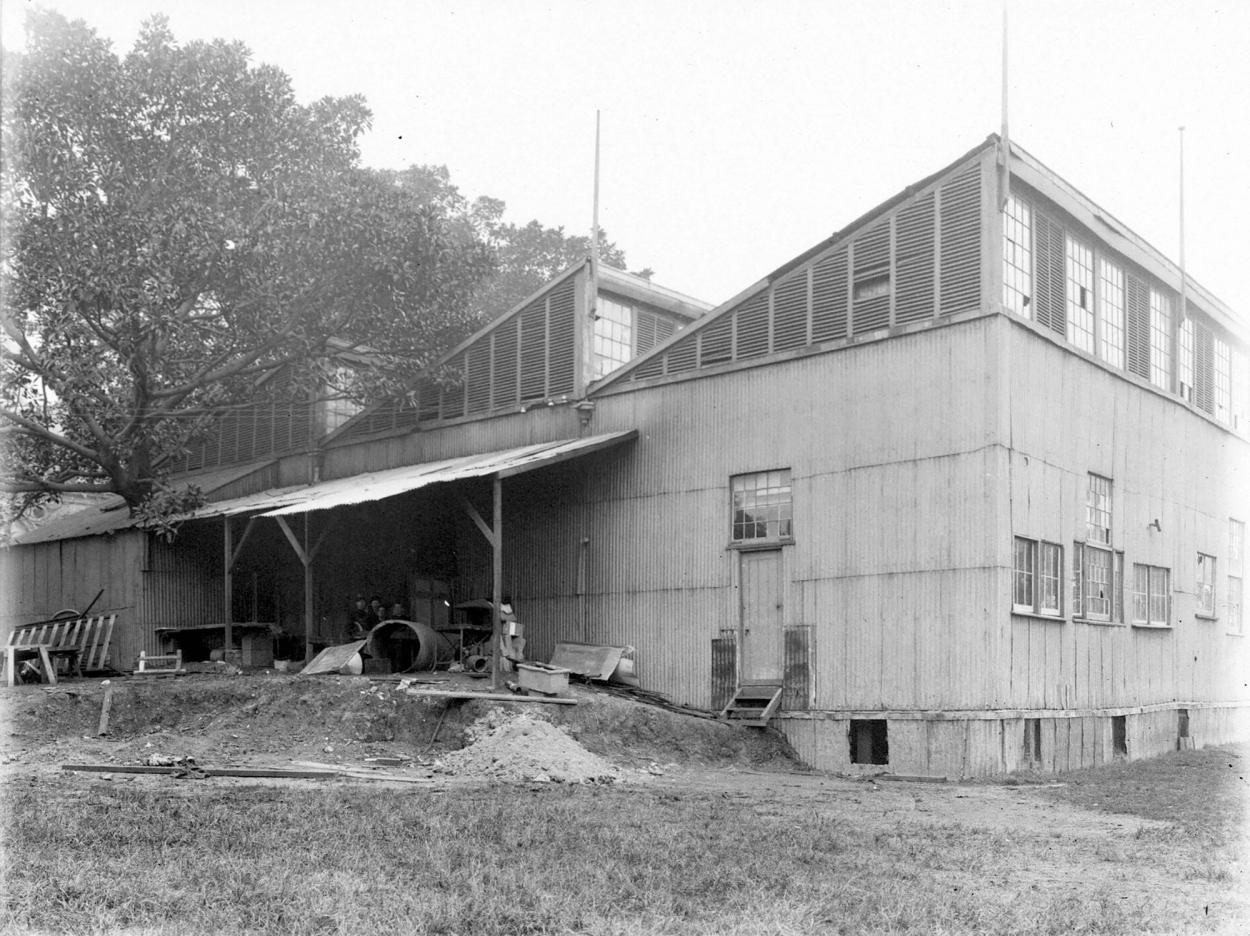 Black and white photograph of tin shed - the old Technological Museum