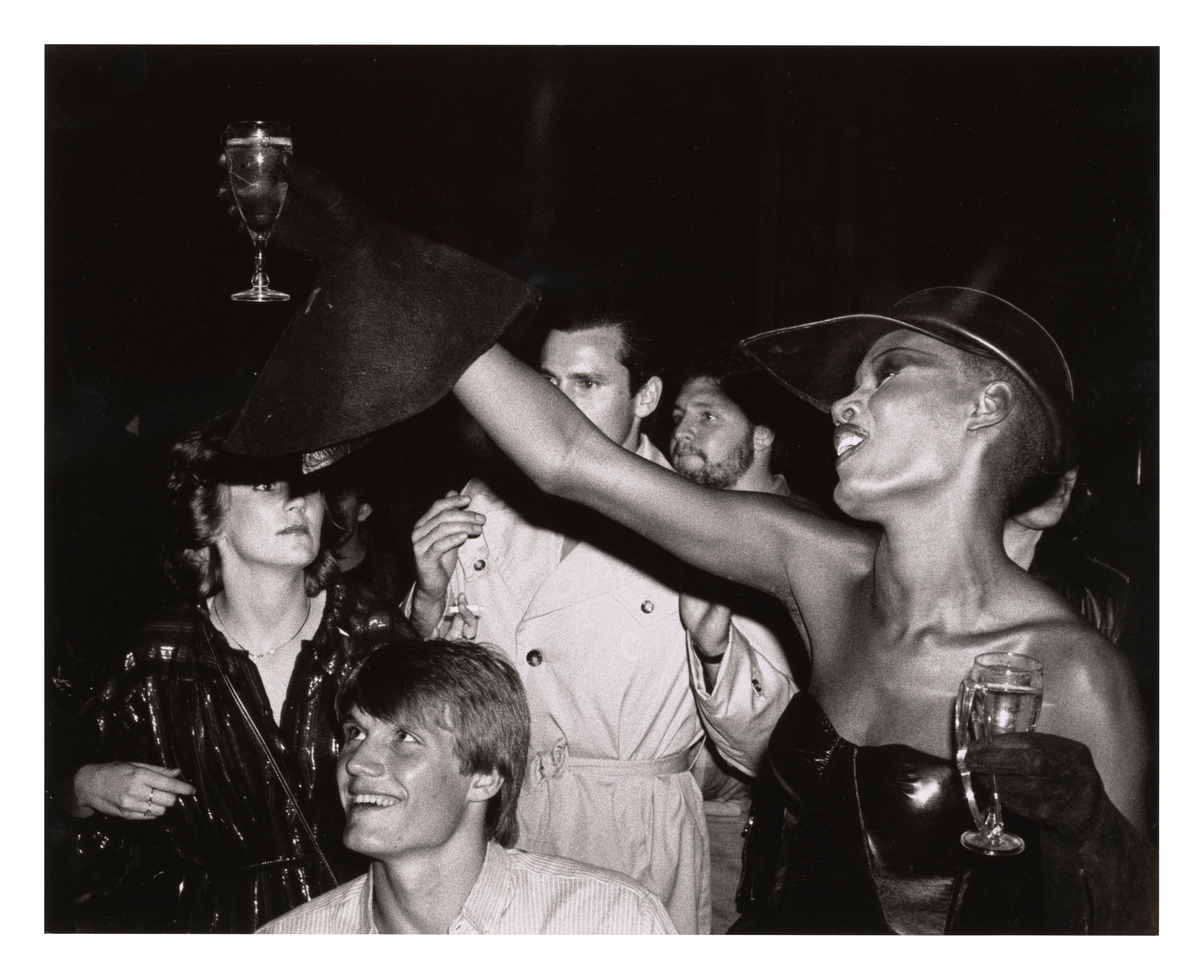 Black and white photograph of a party