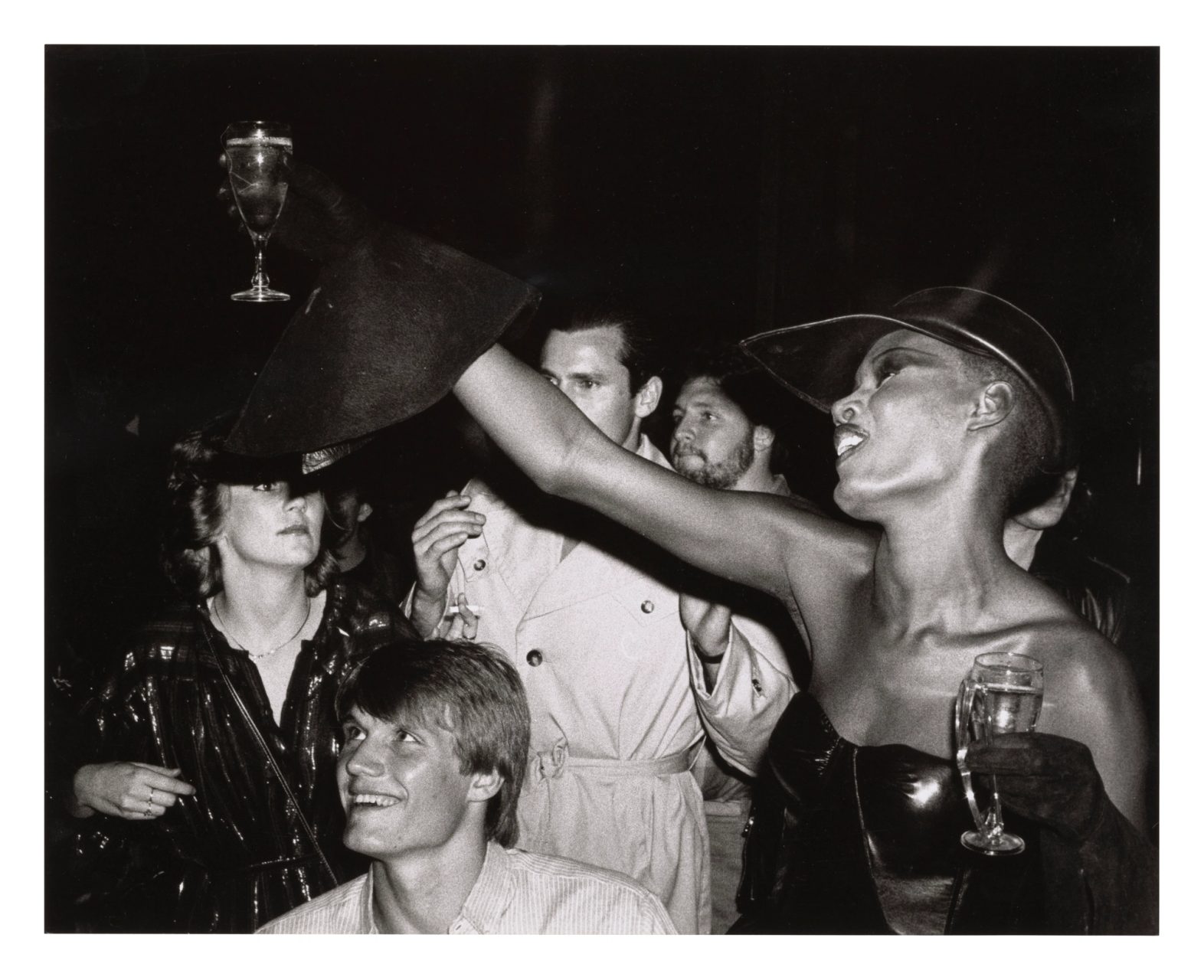 Black and white photograph of a party