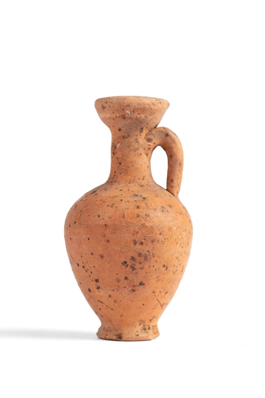 A small earthenware vessel used for holding wine.