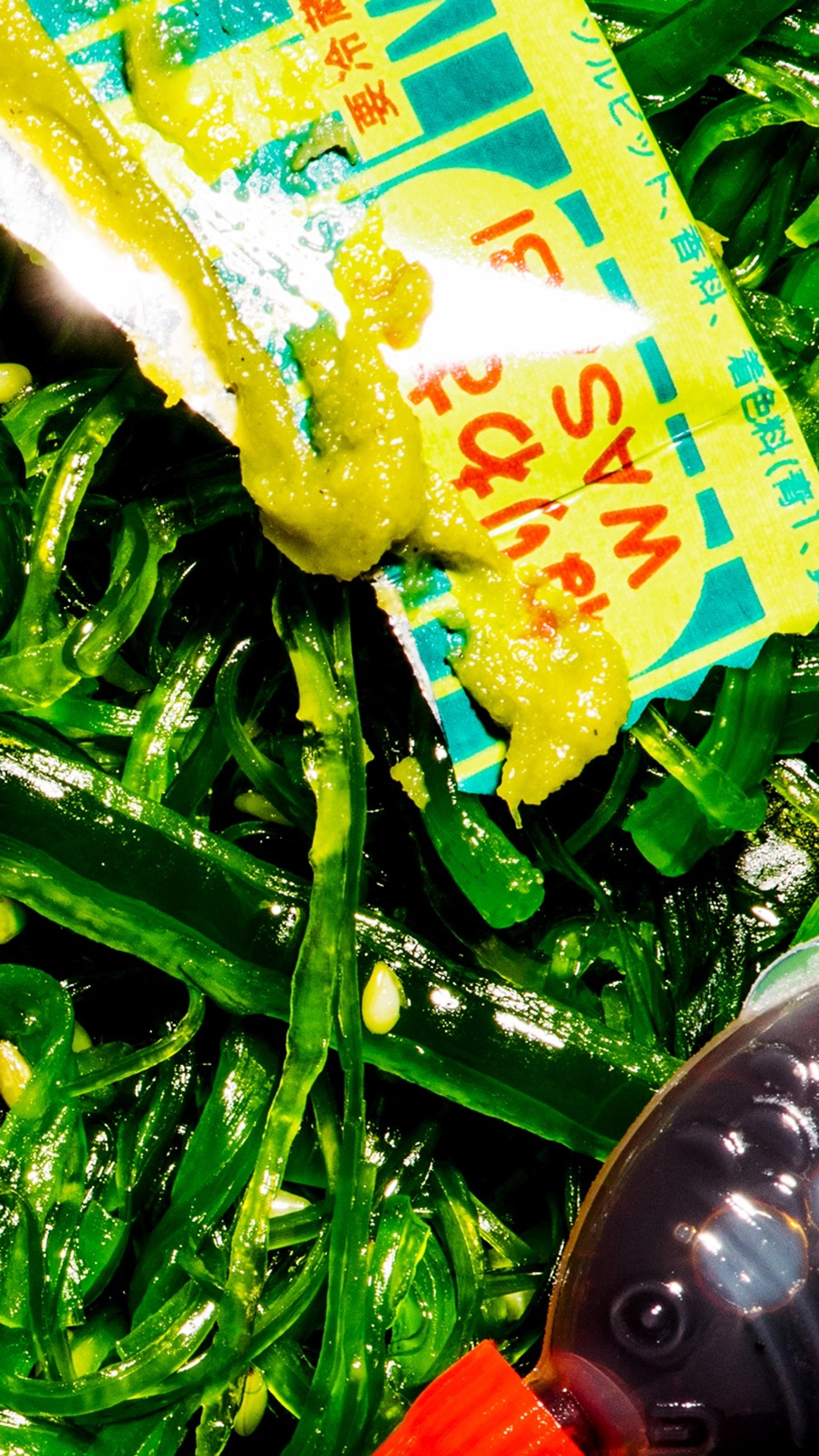 Seaweed, wasabi packet and soy sauce fish.