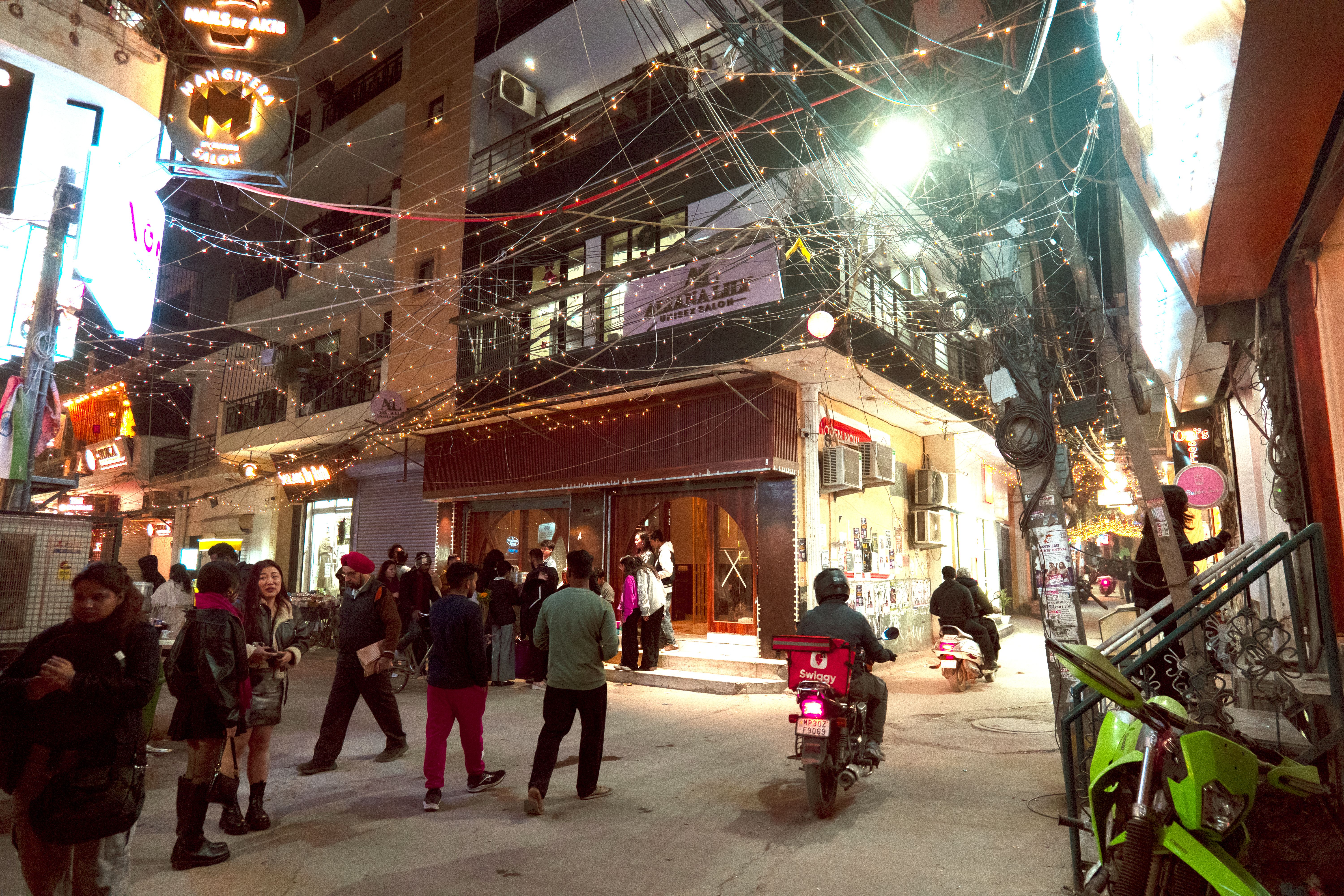 An Indian food precinct at night.