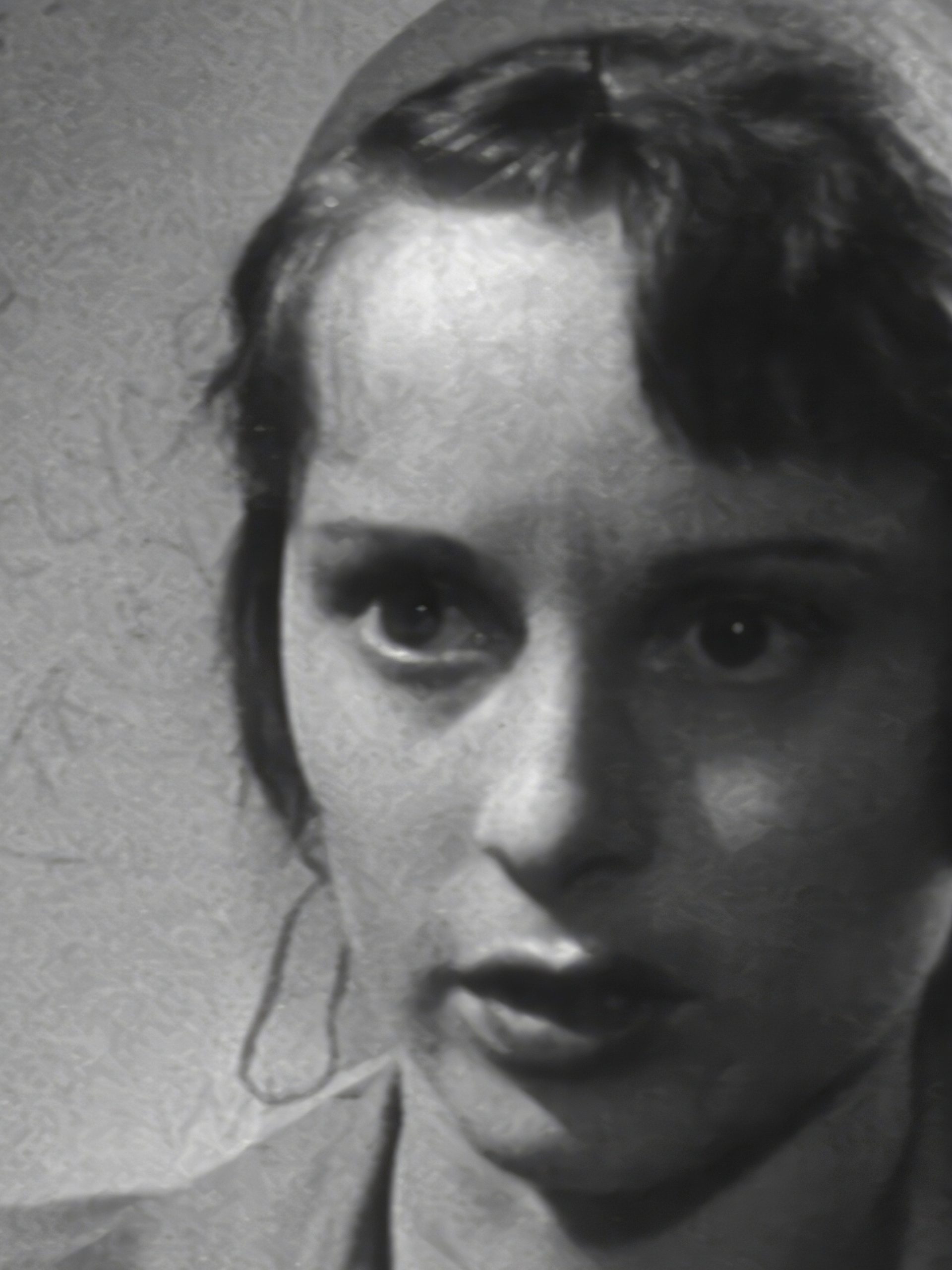 Black and white close up of woman’s face
