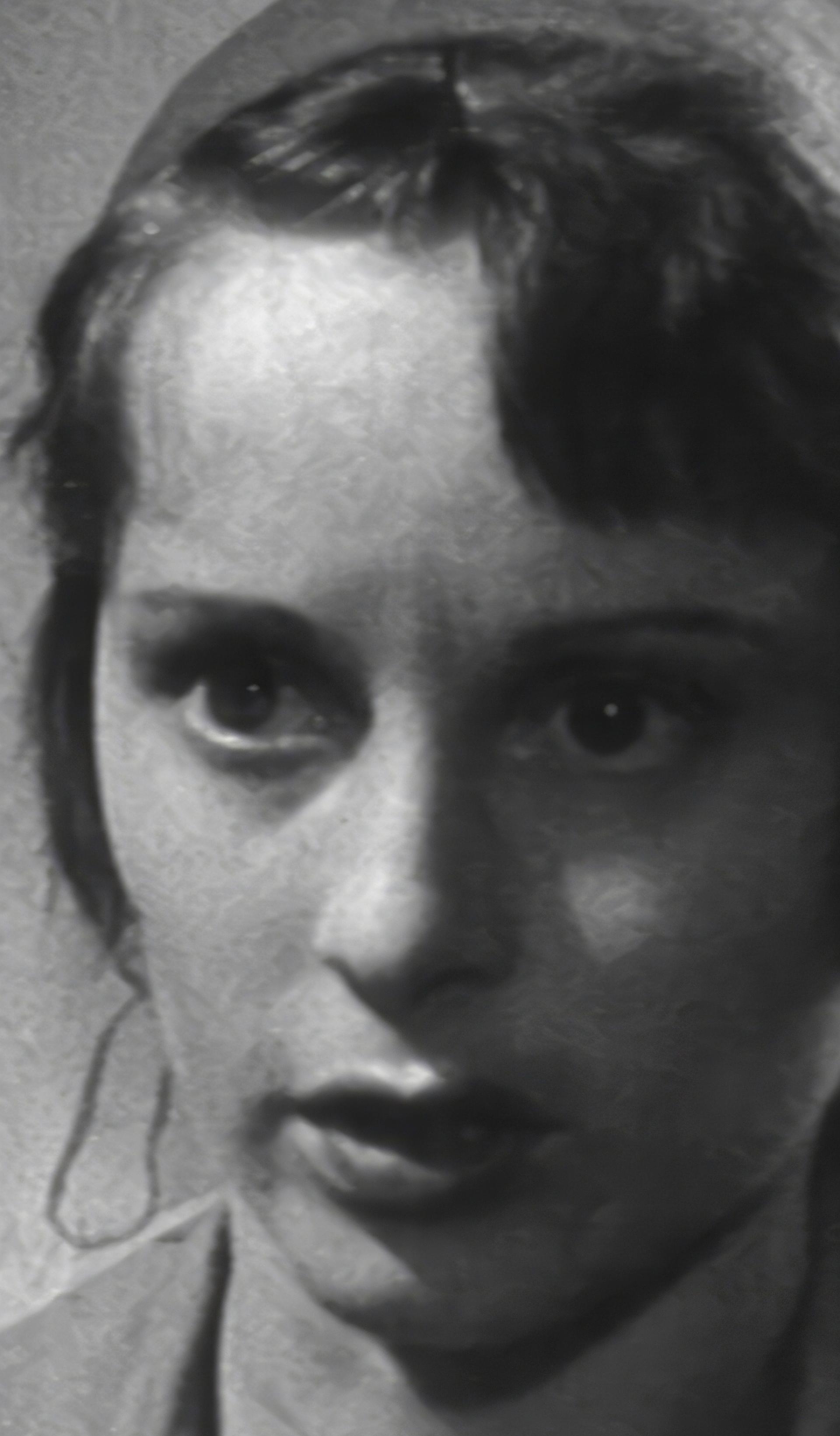 Black and white close up of woman’s face