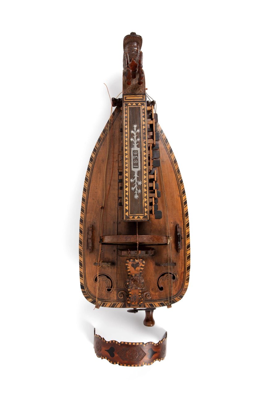 A decorative wooden stringed instrument.