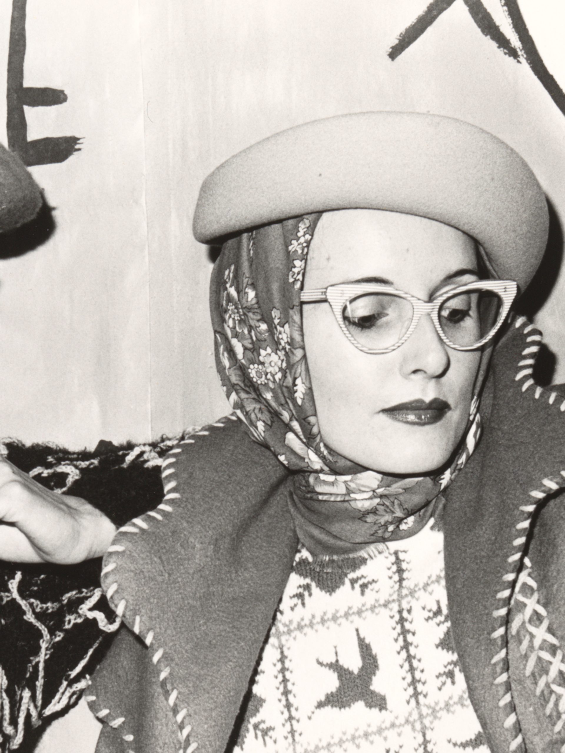 A black and white photograph of designers Jenny Kee wearing a Kee designed knit and Linda Jackson wearing a Linda Jackson designed jacket.