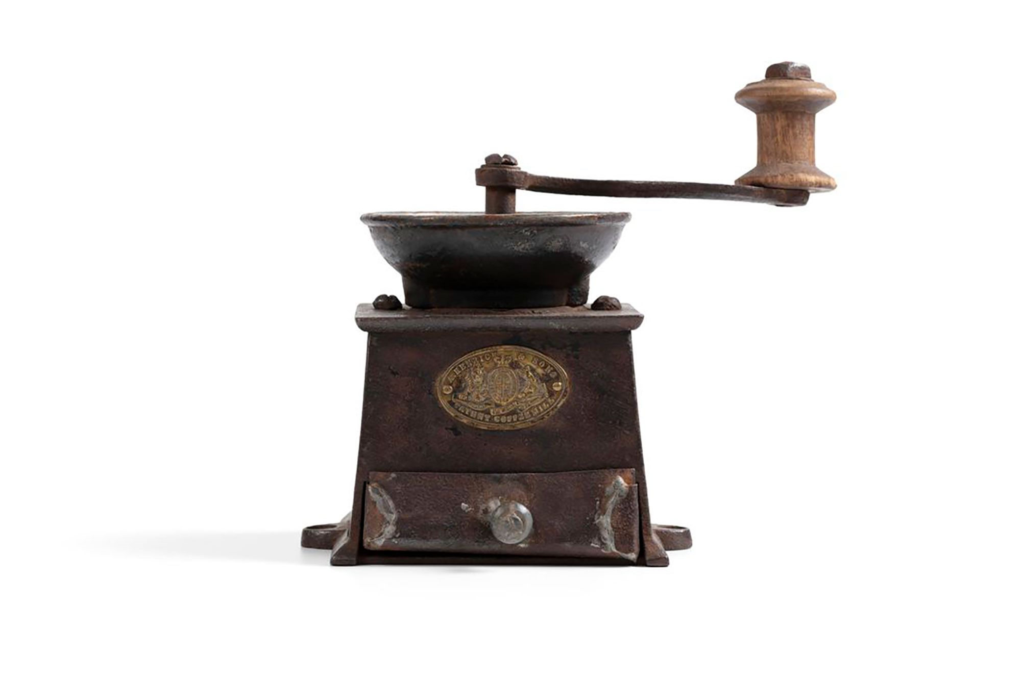 Coffee mill is of the box type, with a metal drawer at the bottom.