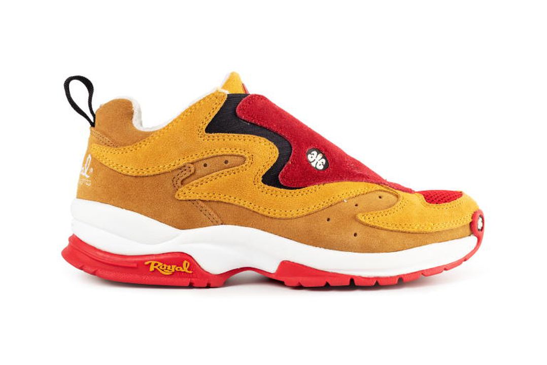 Pair of womens sports fashion fusion shoes with red and yellow leather uppers, and white and red rubber soles.