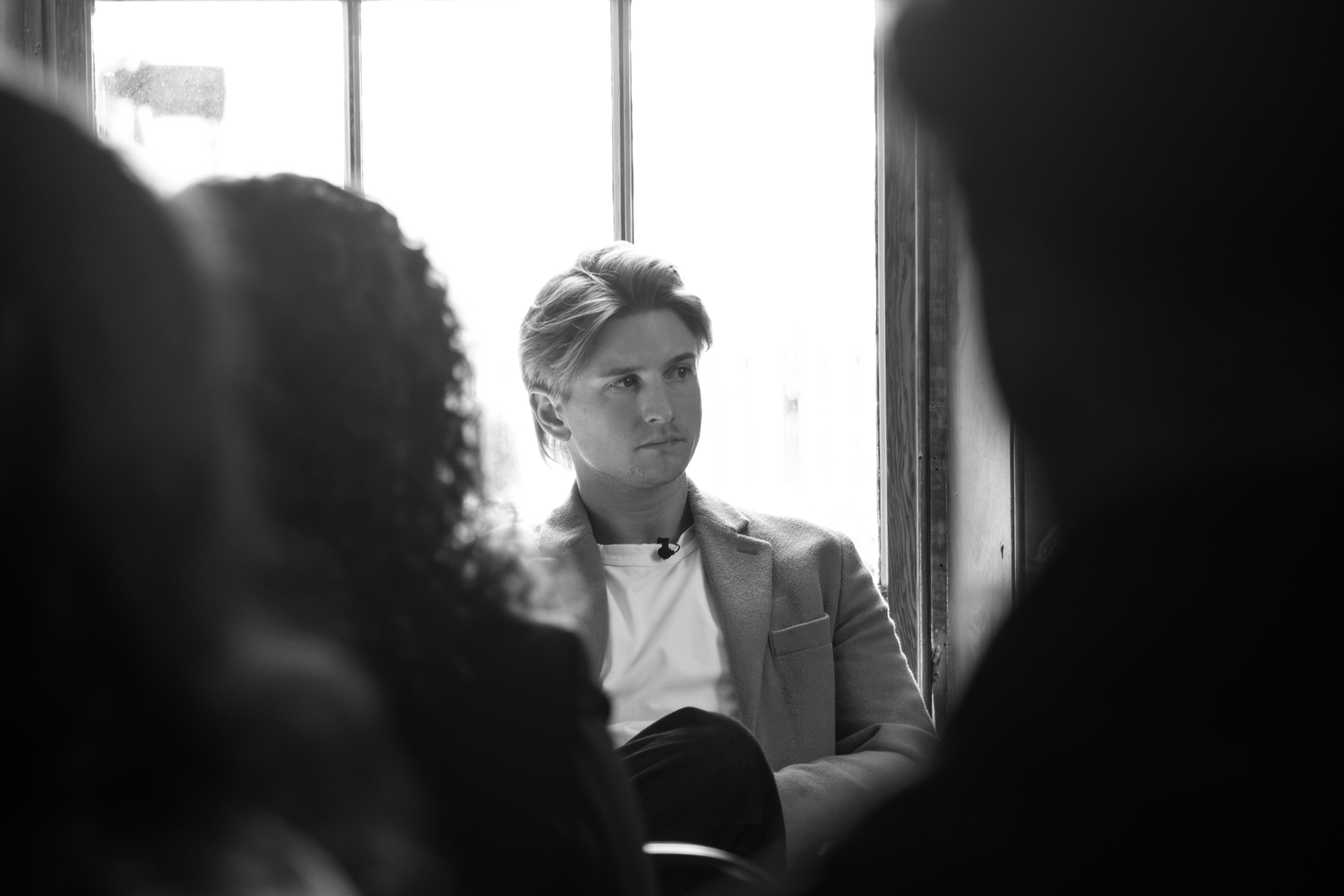 A Wiradjuri Dabee man sits and listens.