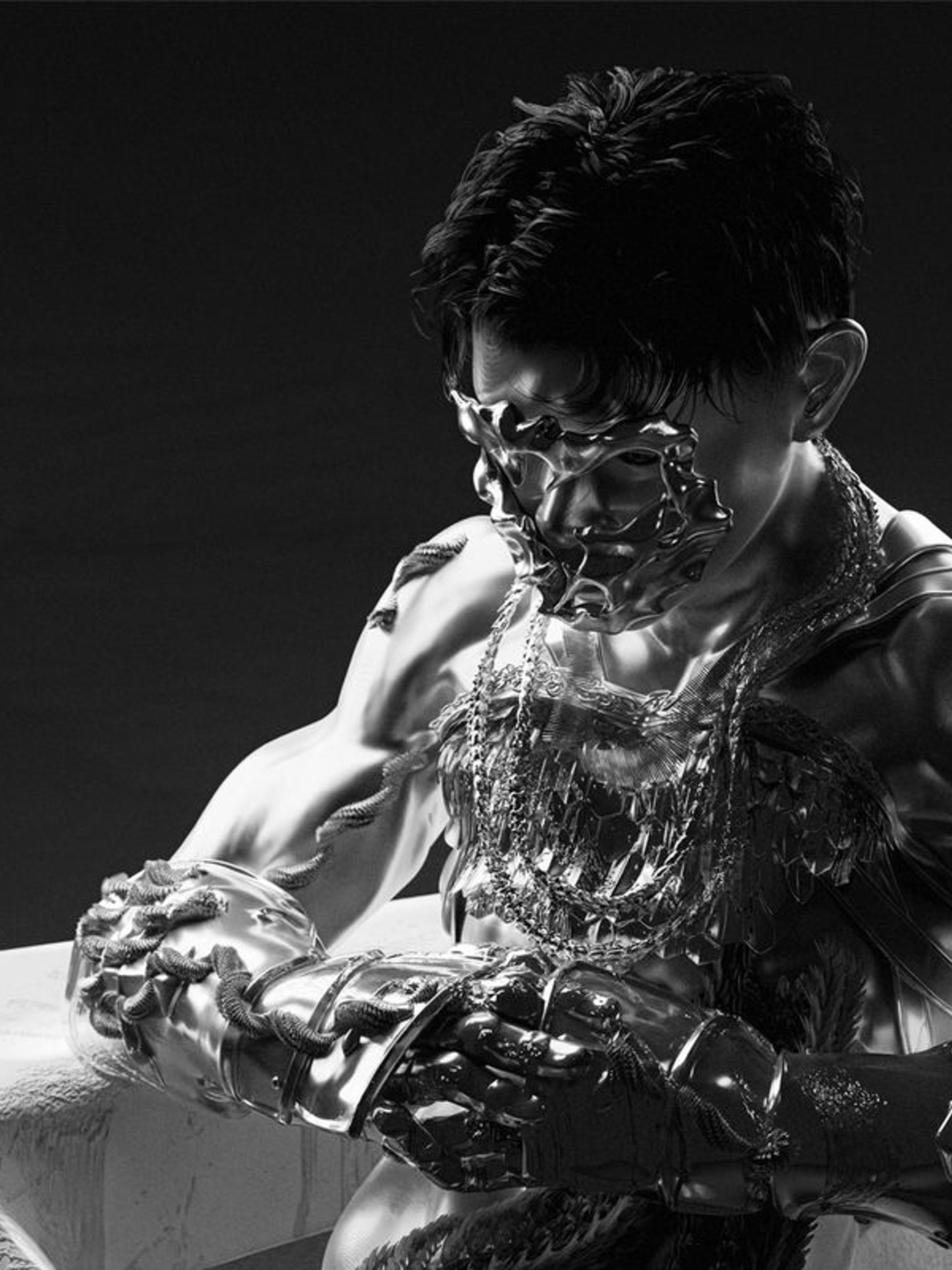 A 3D rendered figure with silver armour on their face, chest, and forearm.