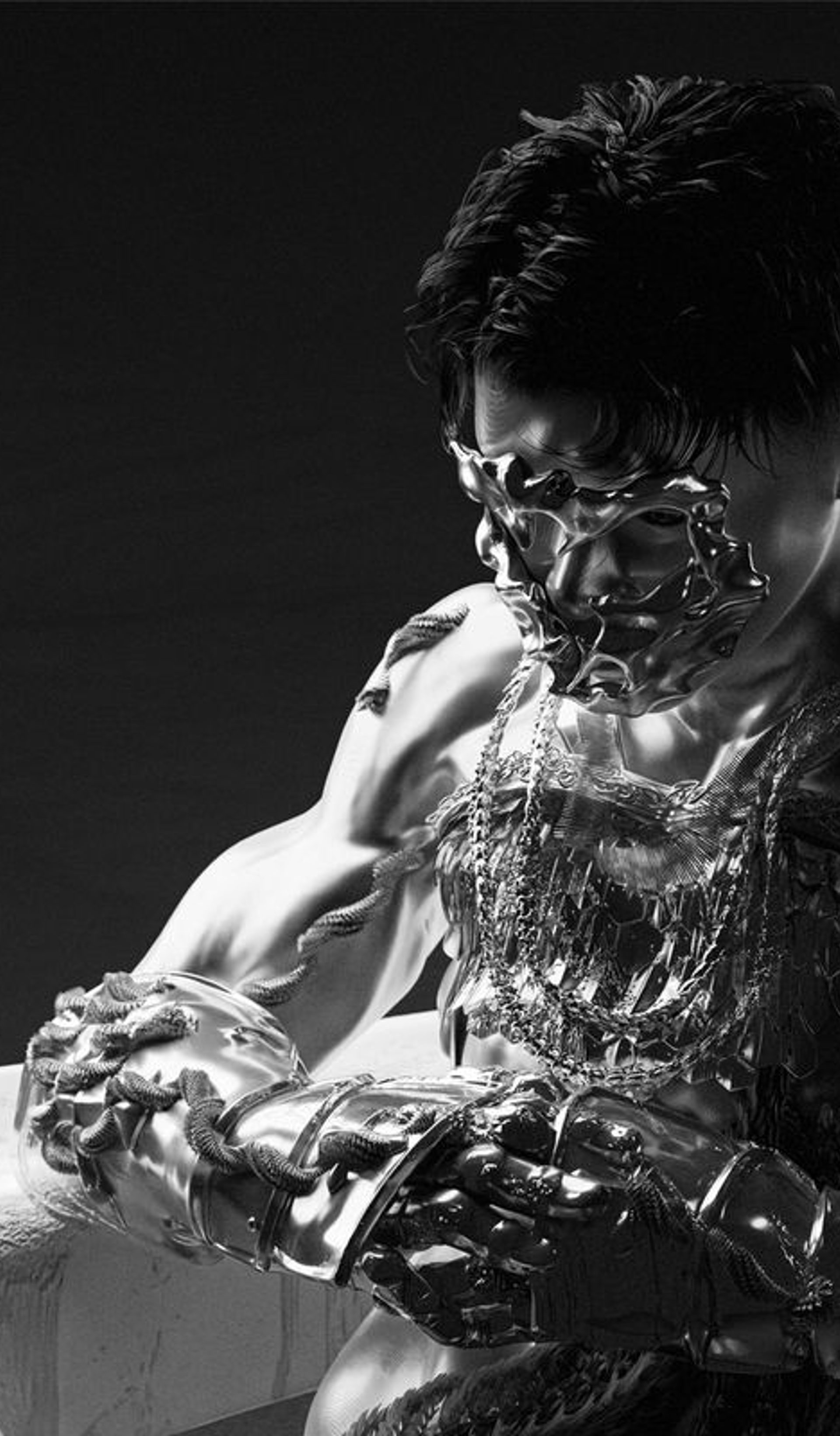 A 3D rendered figure with silver armour on their face, chest, and forearm.